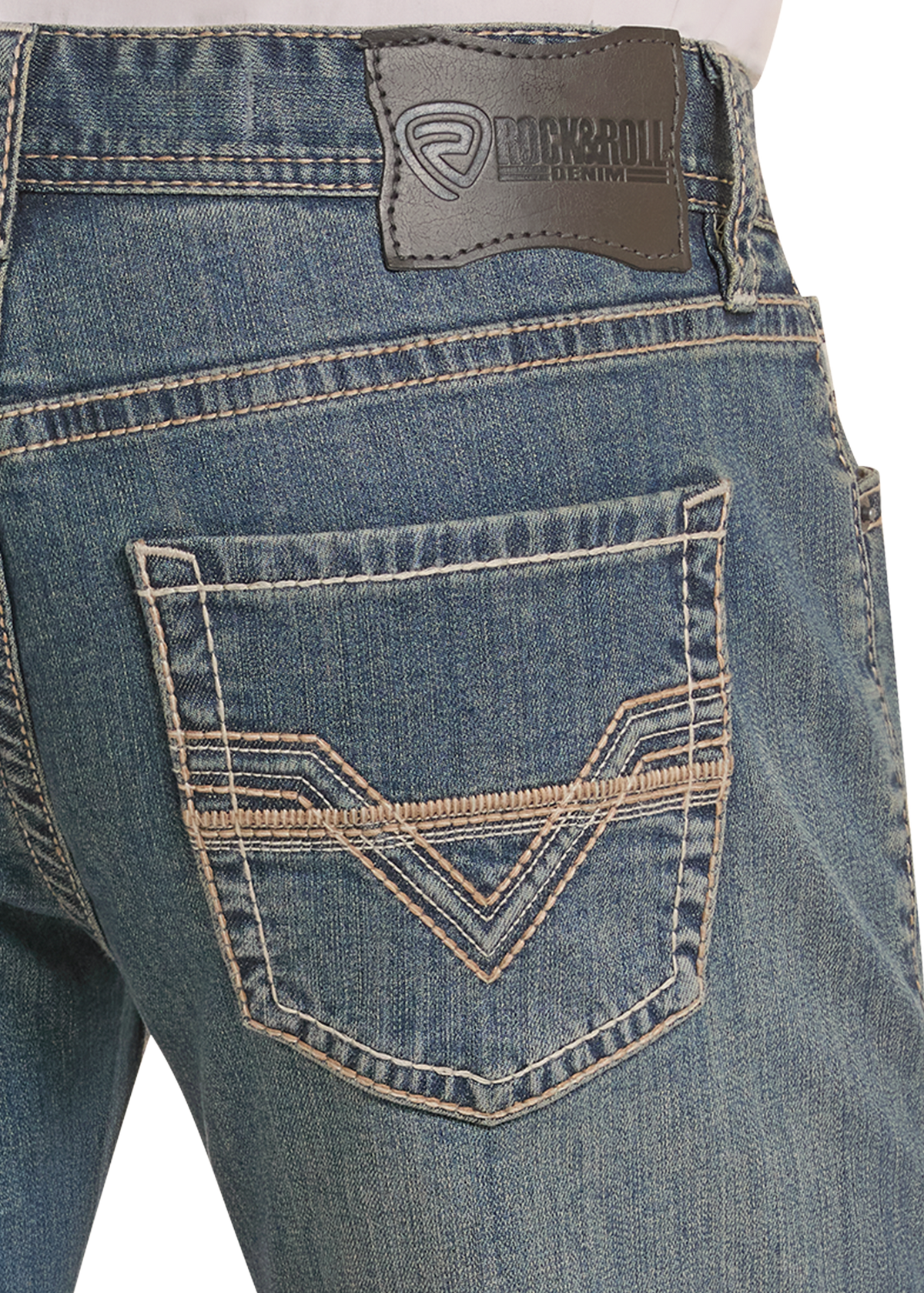 Close up detail image of an embroidered denim pocket. 
