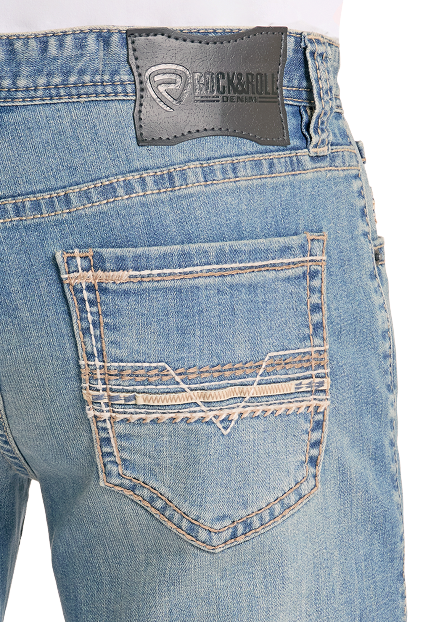Close-up of blue jeans with a brand logo on the pocket area.