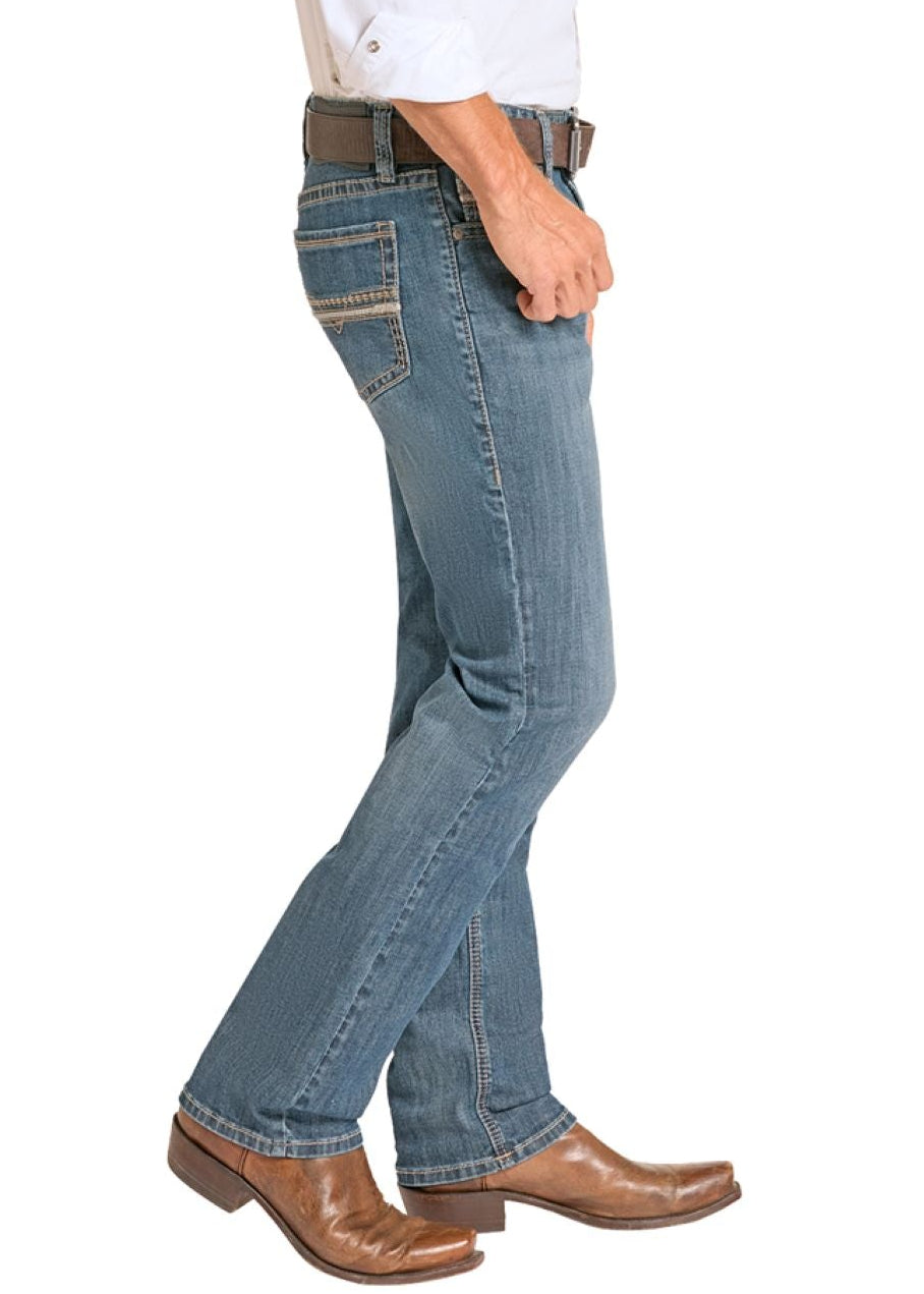 Man wearing a white shirt, blue jeans, and  cowboy boots on a white background