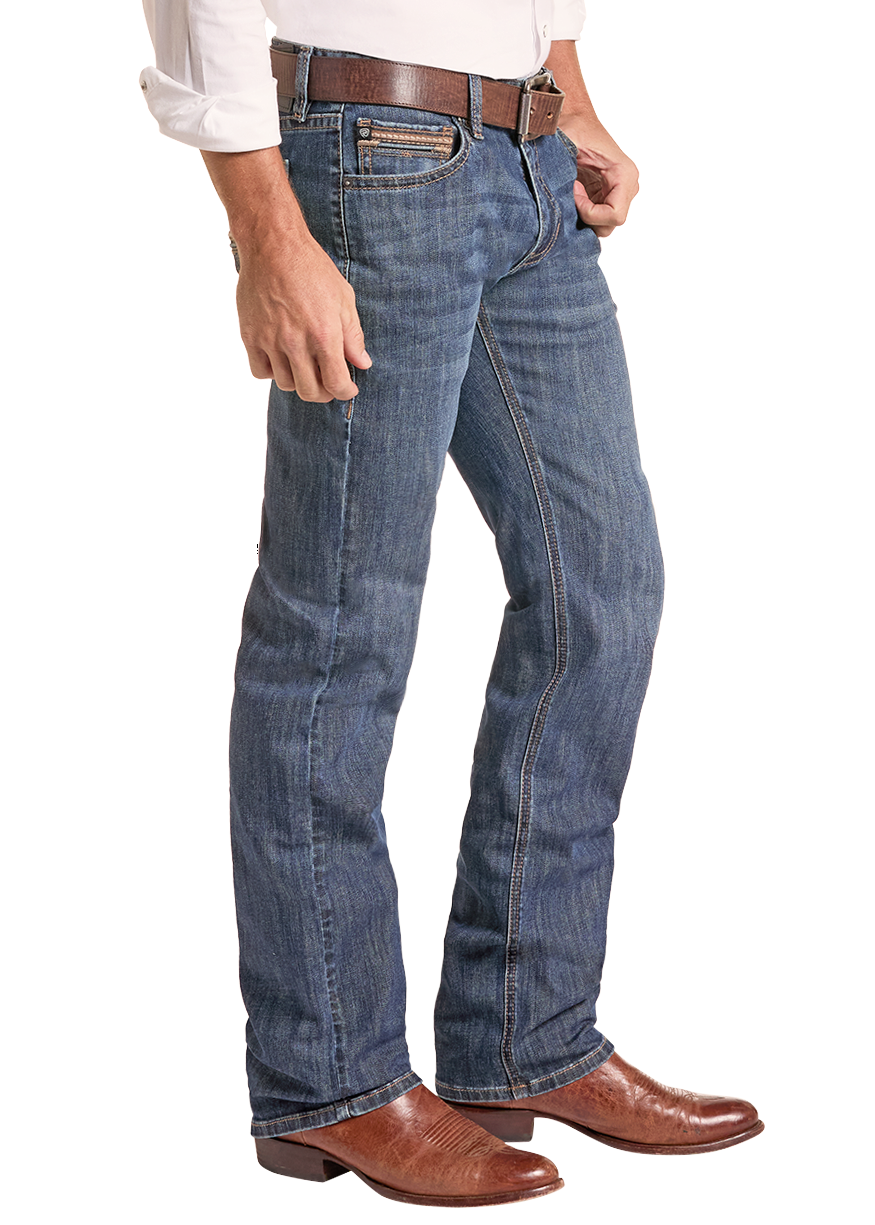 A man shown in profile wearing a light beige cowboy hat, a white long-sleeve button-up shirt, blue jeans, a brown belt, and brown leather boots against a plain white background.