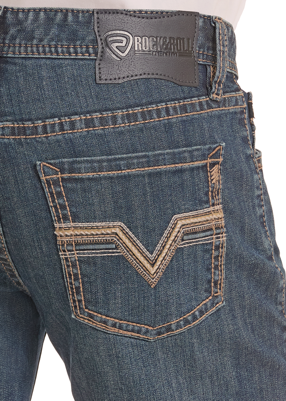 Close up of an embroidered jean pocket.