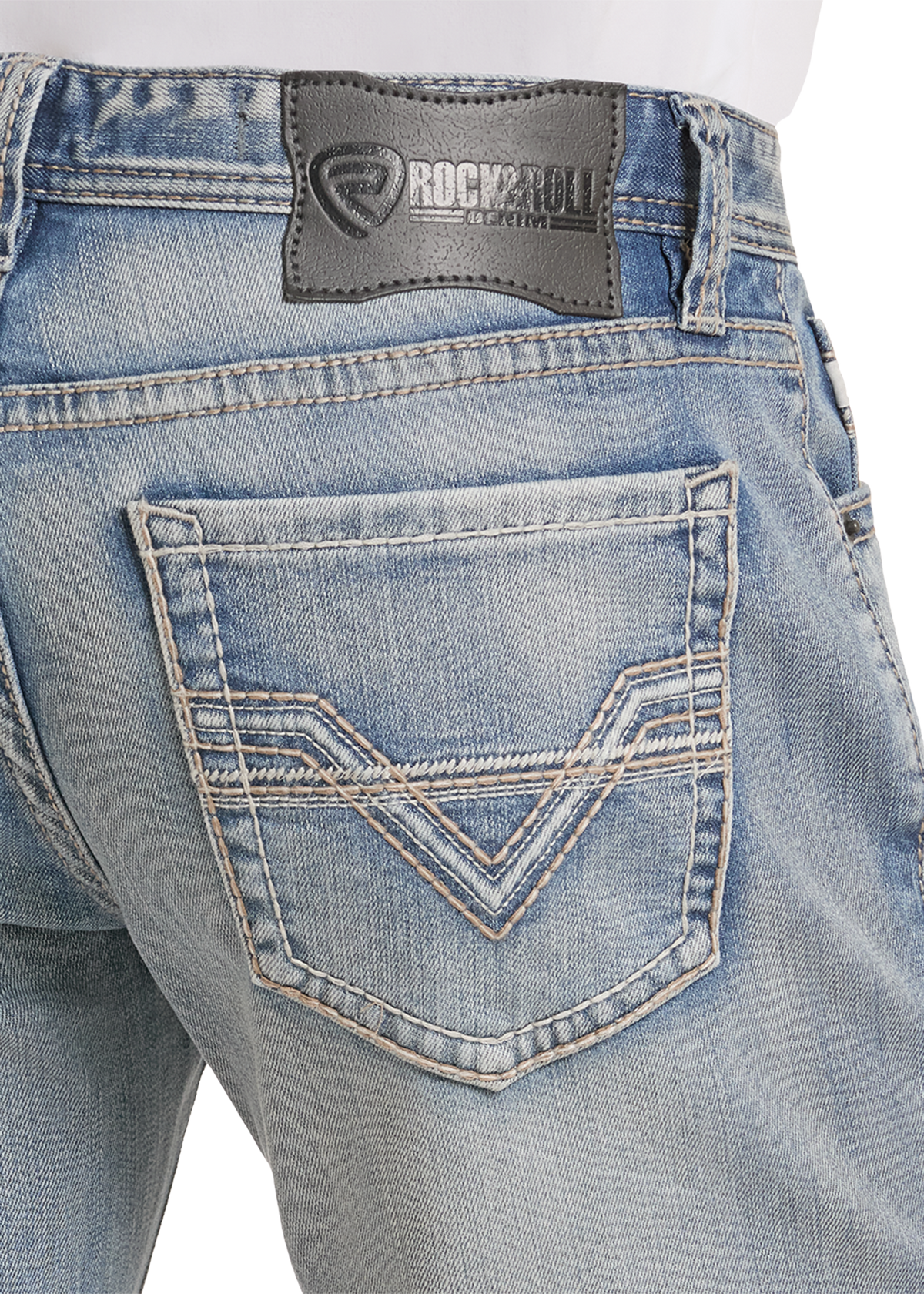Detail image of an embroidered denim pocket. 