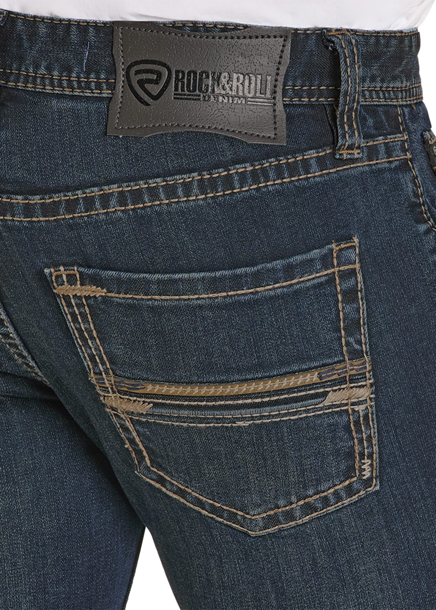 Close-up of blue jeans with a visible brand label on a white background