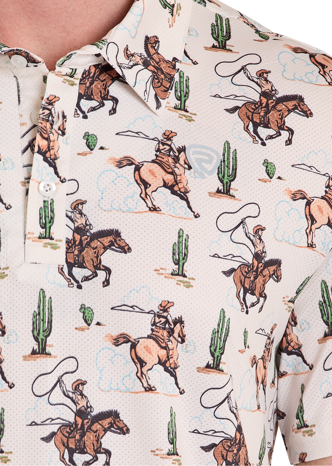 Close-up of a polo shirt with cowboy and desert pattern