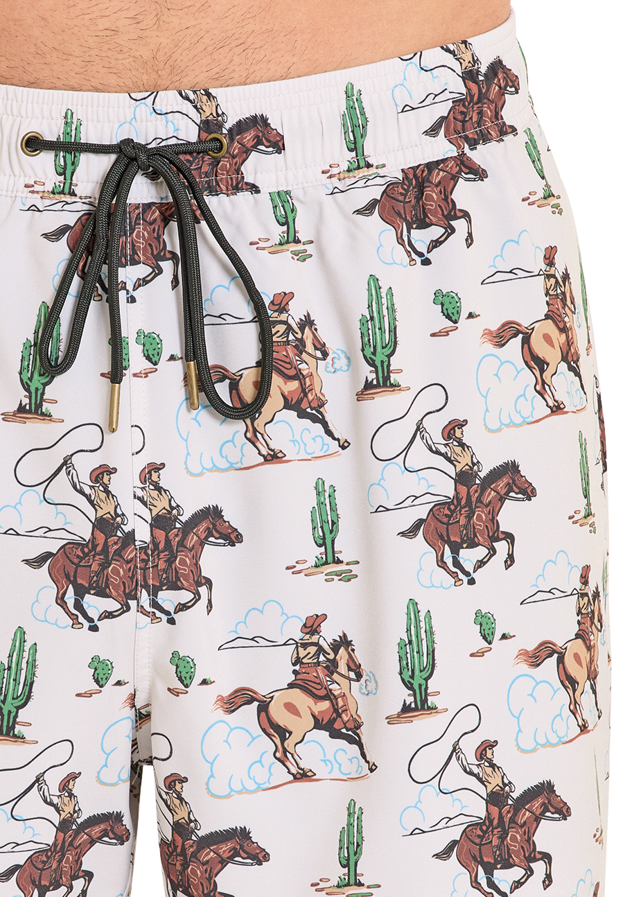 swim trunks with cowboy and horse pattern on a white background