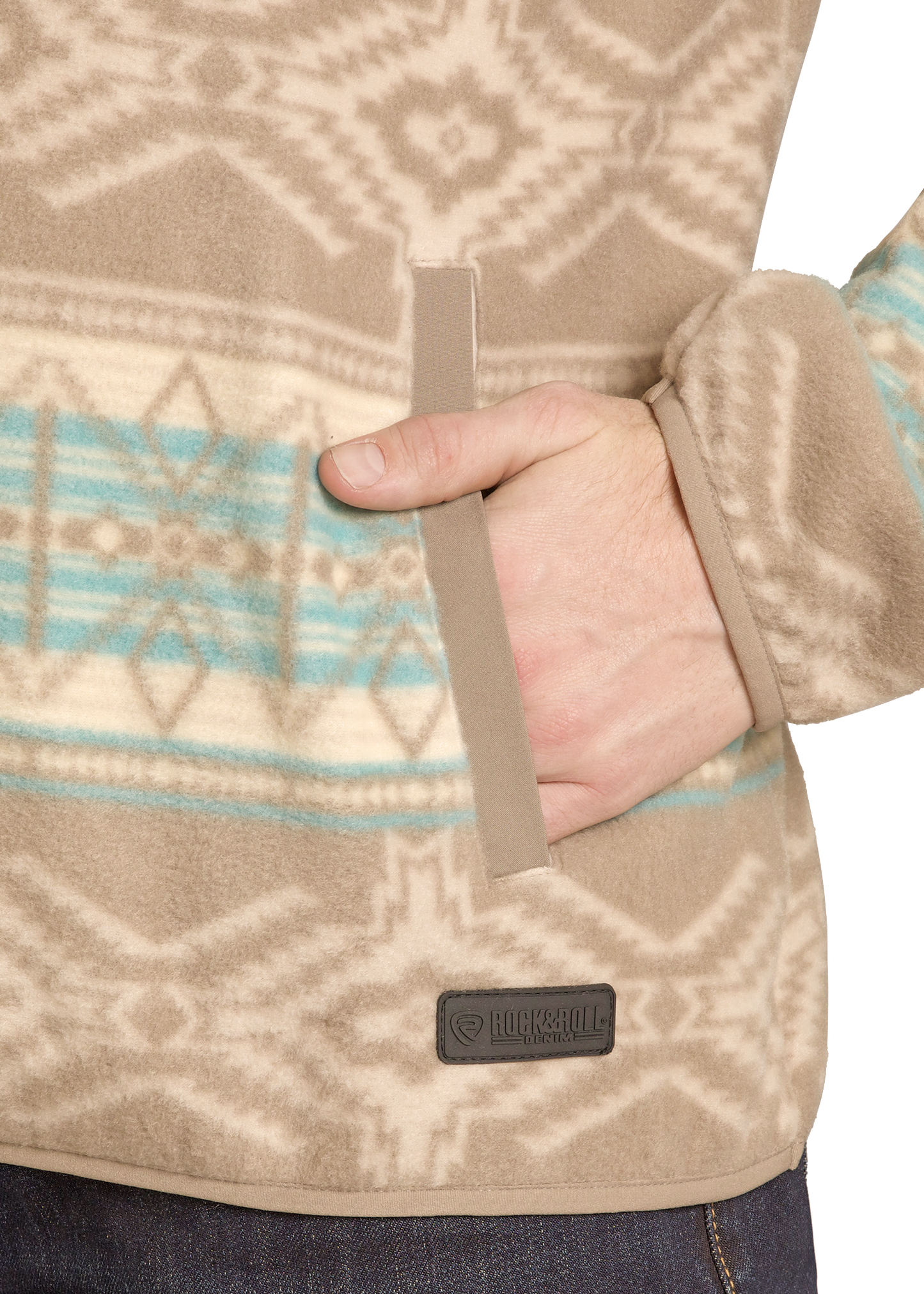 Close-up of a beige patterned jacket with a brand logo on a white background