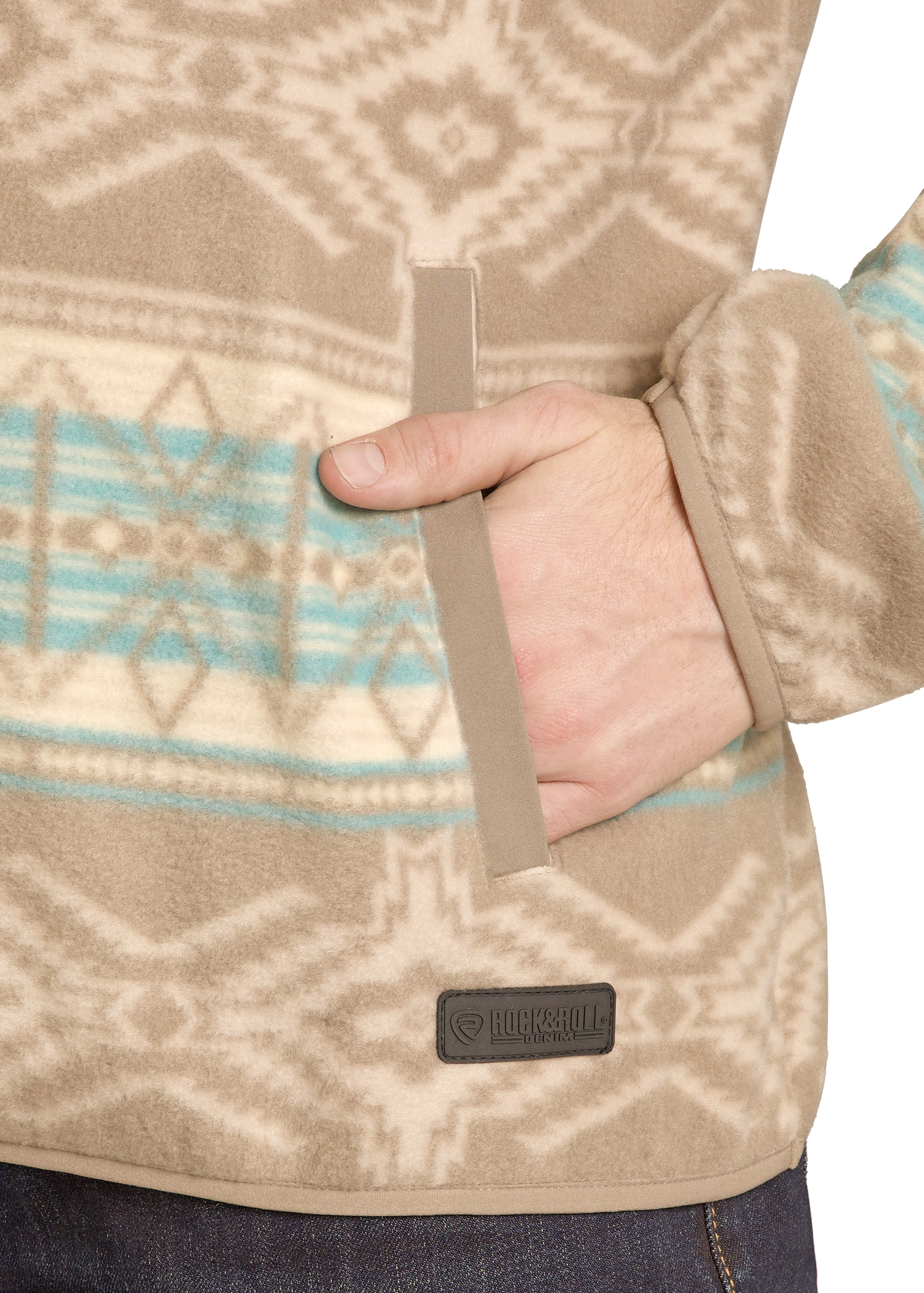 Close-up of a beige patterned jacket with a brand logo on a white background