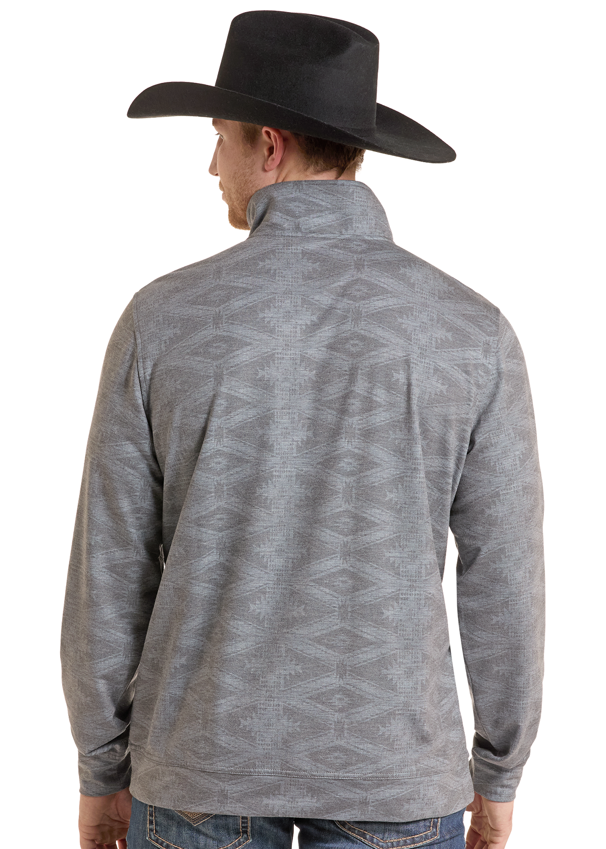 The back of a man in an Aztec collared quarter zip.