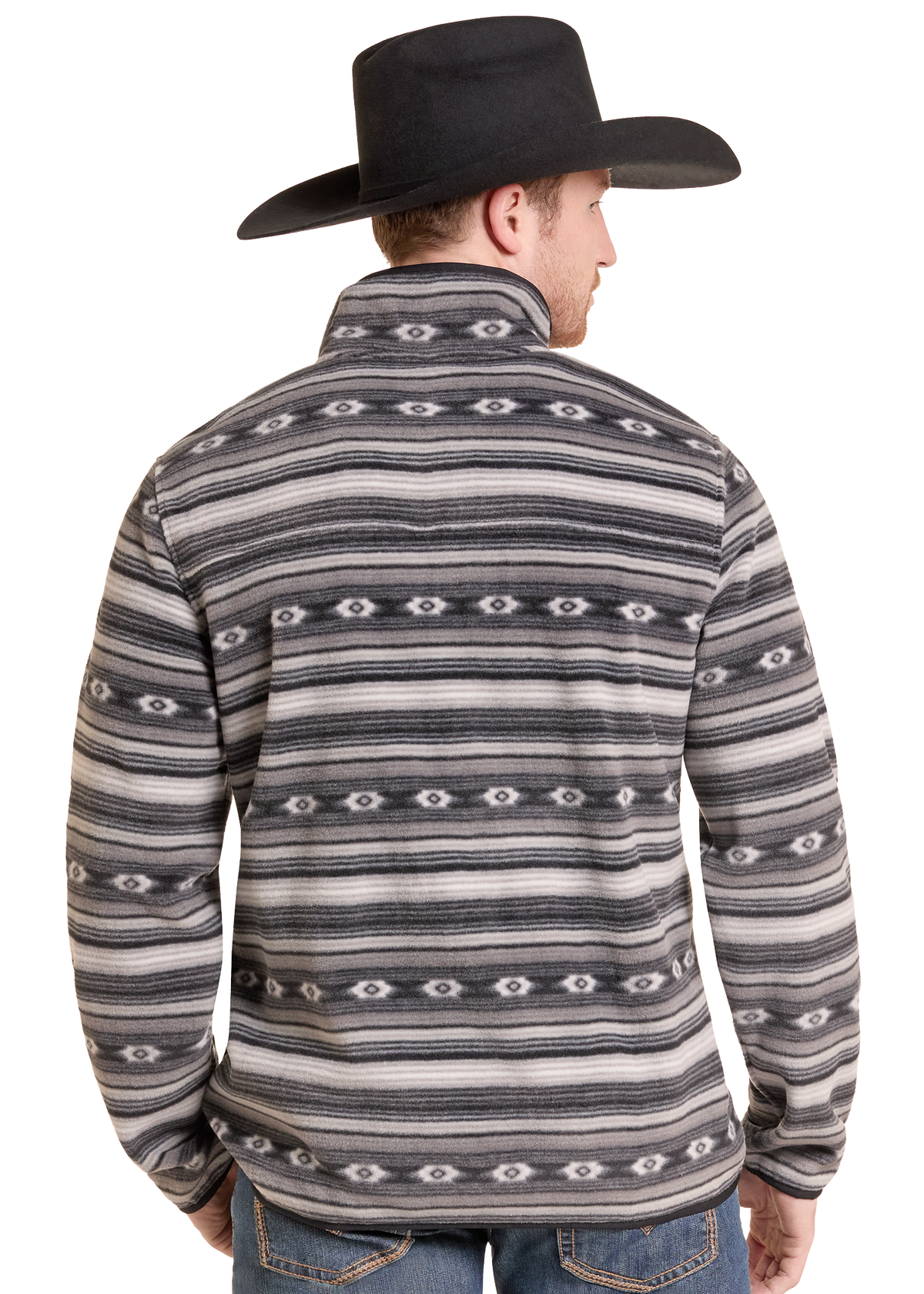 The back of a man in a fleece Aztec pullover. 