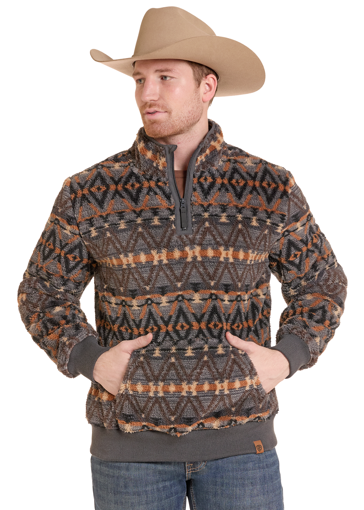 Man in an Aztec print sherpa quarter zip.