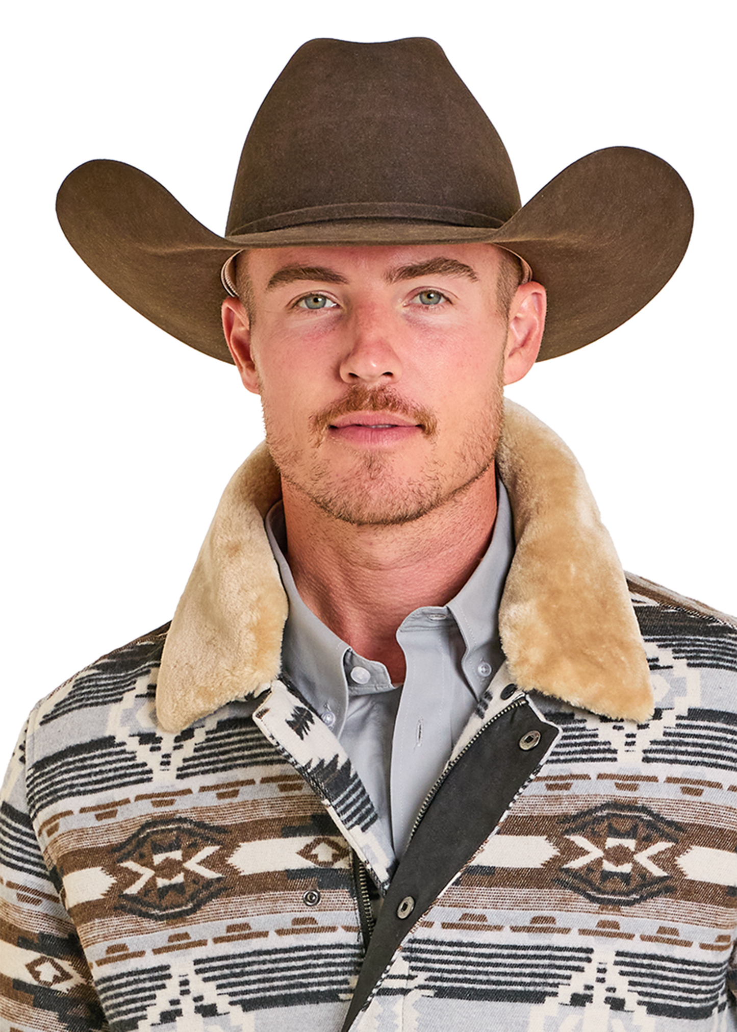 Man wearing a brown cowboy hat and patterned jacket on a white background