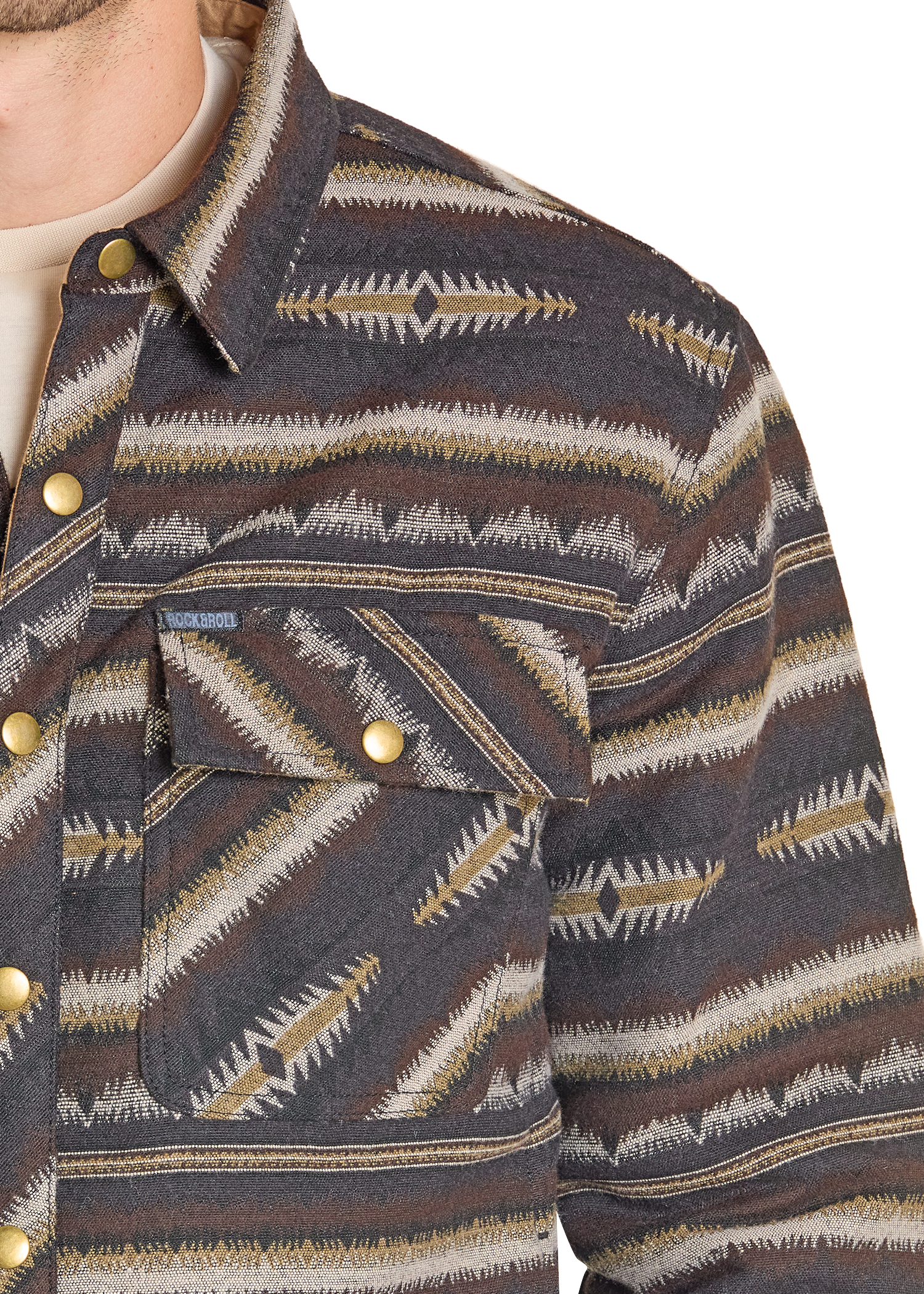 Close-up of a patterned jacket with a brand logo on a white background