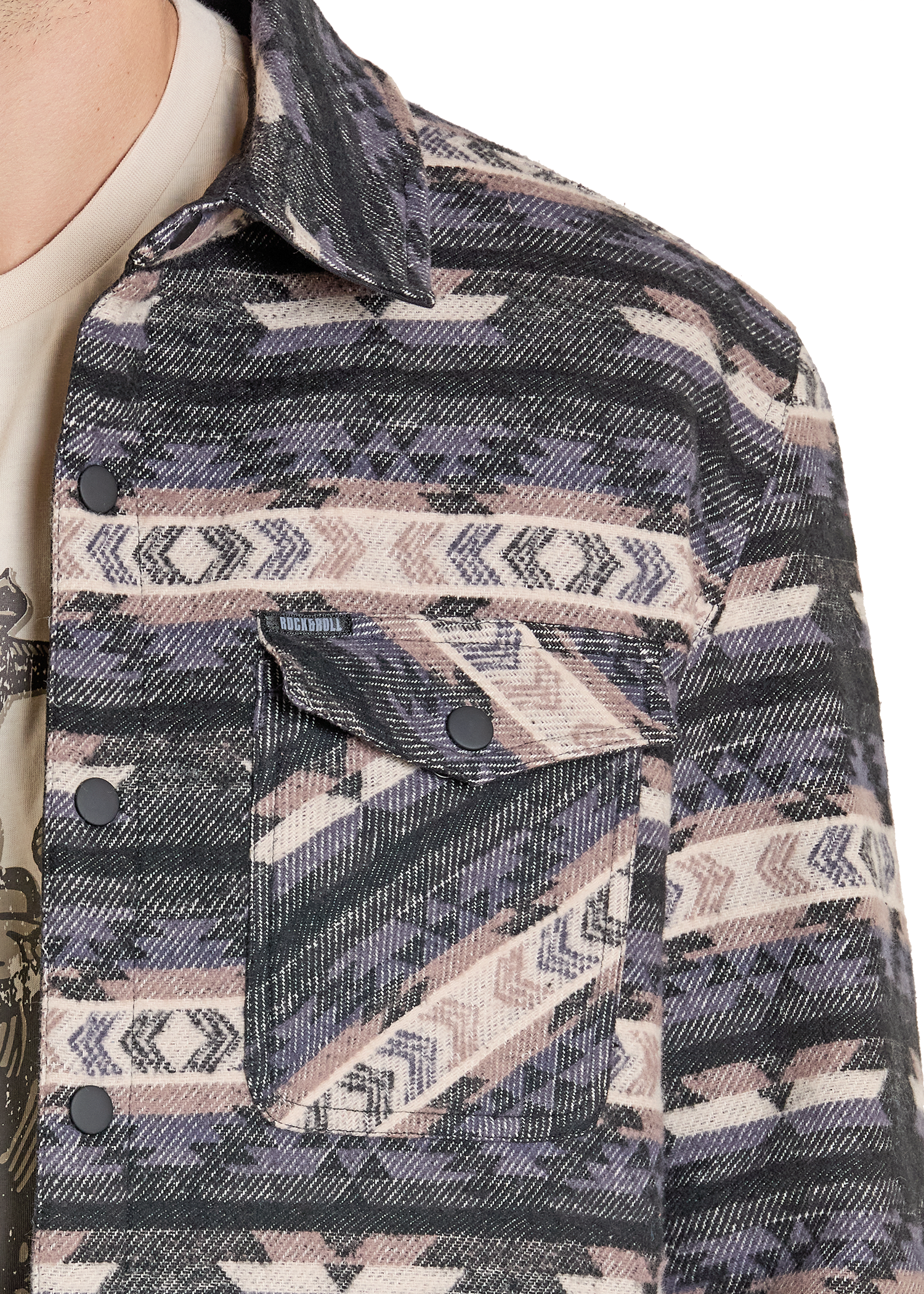 Close-up of a patterned jacket with a geometric design on a white background
