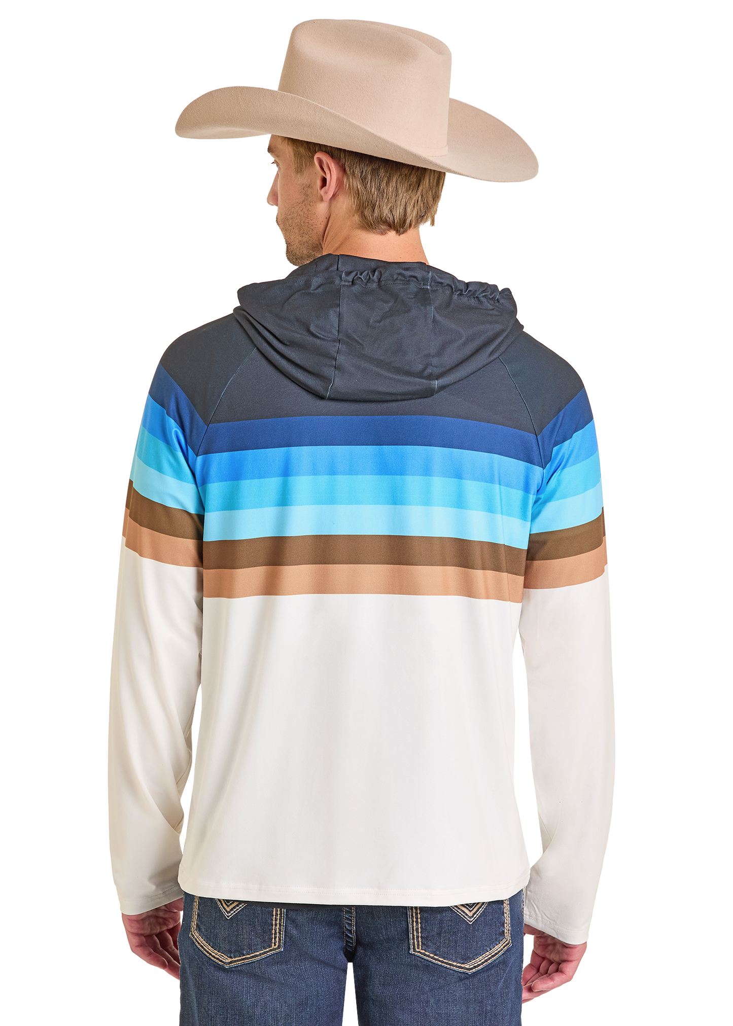 A man wearing a tan cowboy hat and Rock & Roll Denim's Striped Border Performance Hoodie—with horizontal blue, teal, brown, and white stripes on the back and UPF 50 moisture-wicking fabric—is seen from behind, paired with decorative-stitched blue jeans.