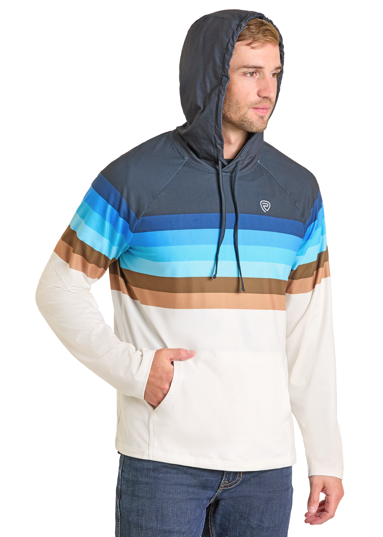 A man in the Rock & Roll Denim Striped Border Performance Hoodie with blue, brown, and white stripes stands with one hand in the front pocket. The moisture-wicking fabric keeps him comfortable. He has light brown hair and wears blue jeans.