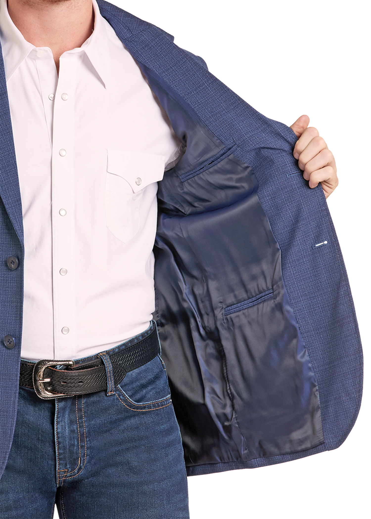 A close-up of a person wearing a navy blue textured blazer over a white dress shirt and blue jeans, opening the blazer to show the interior lining.