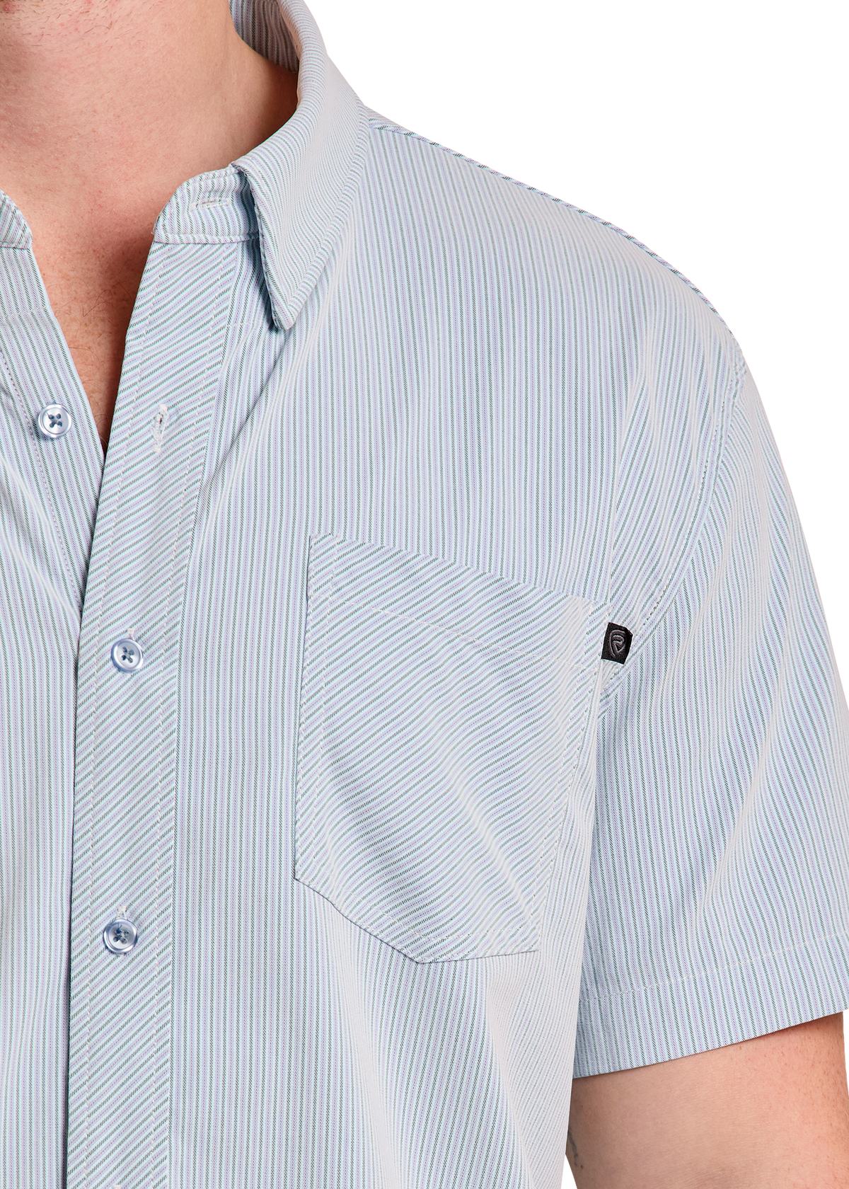 Close-up of a man wearing a short-sleeve button-up shirt with thin vertical pinstripes in light blue and white, featuring a chest pocket and a small black brand tag.
