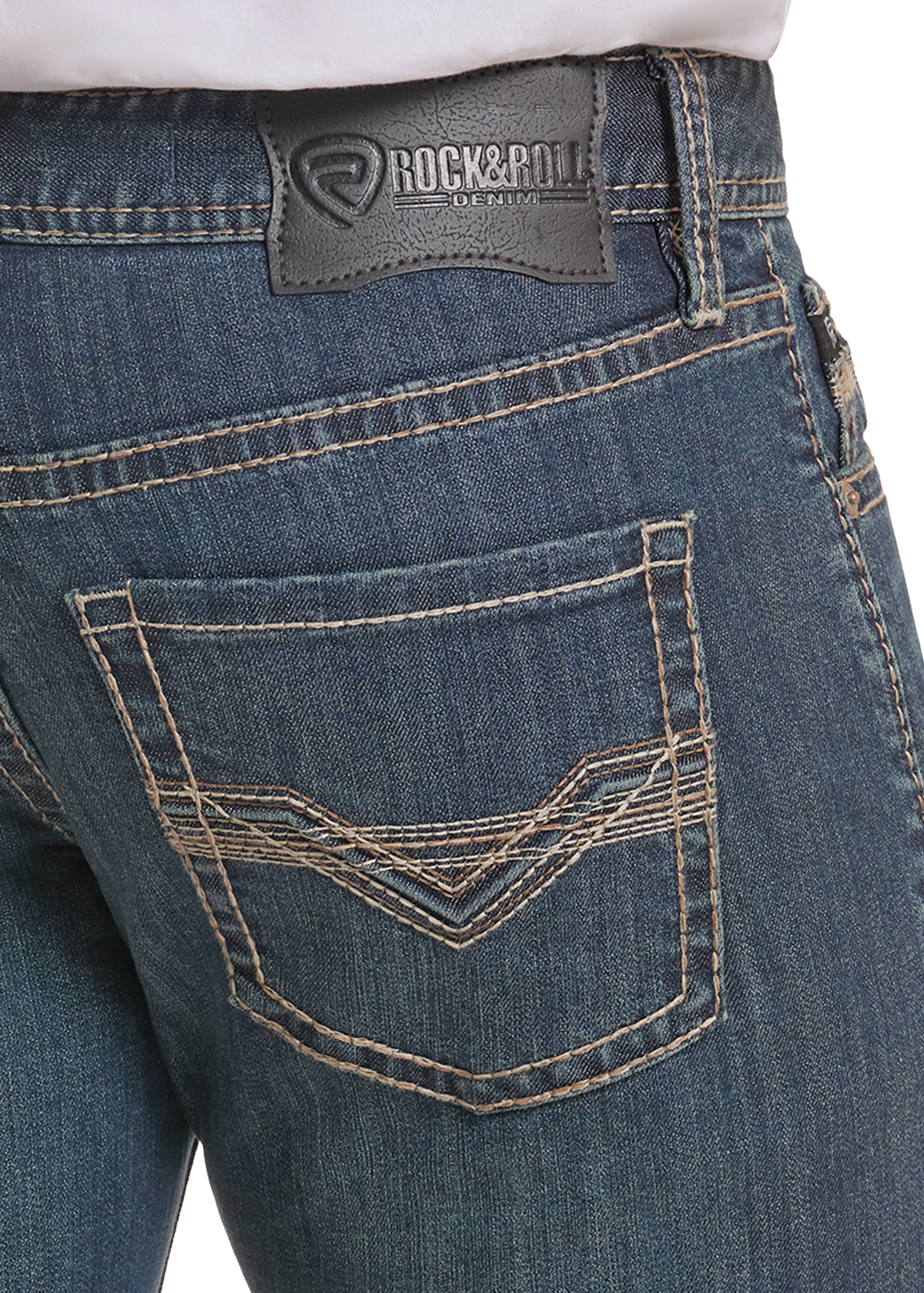 Embroidered pocket on a pair of dark wash jeans. 
