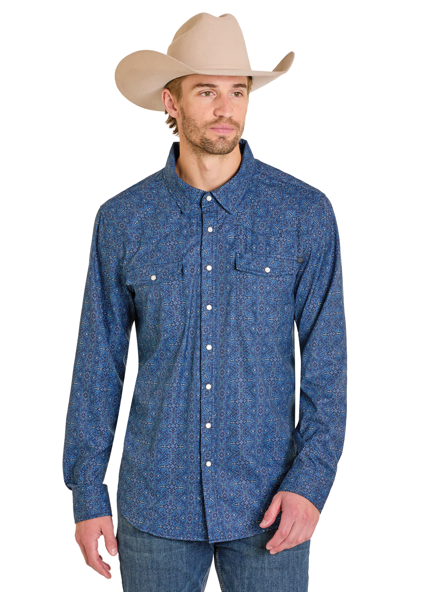 Man wearing a blue patterned shirt and beige cowboy hat on a white background
