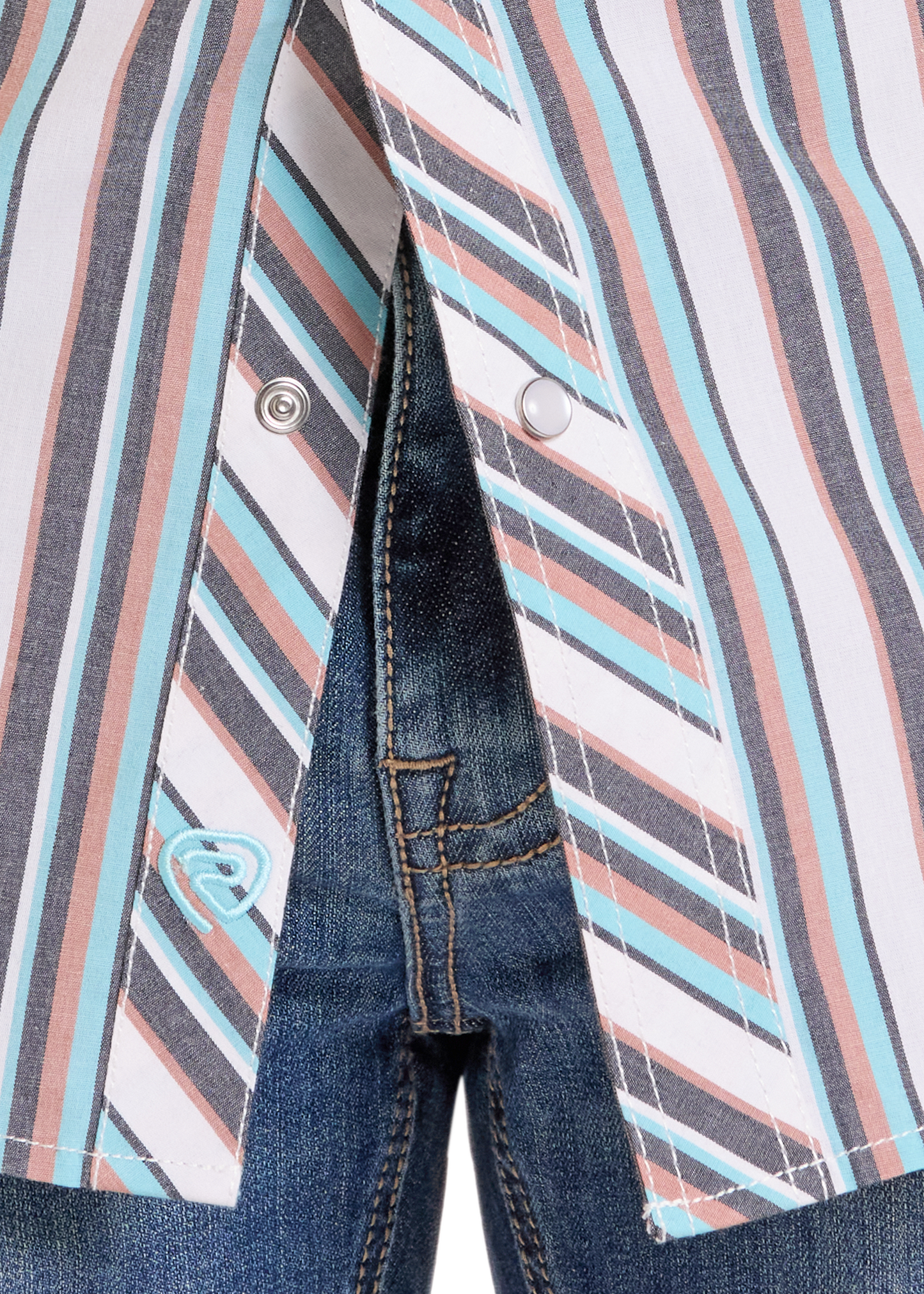 Close-up of a jacket with striped pattern and denim pocket
