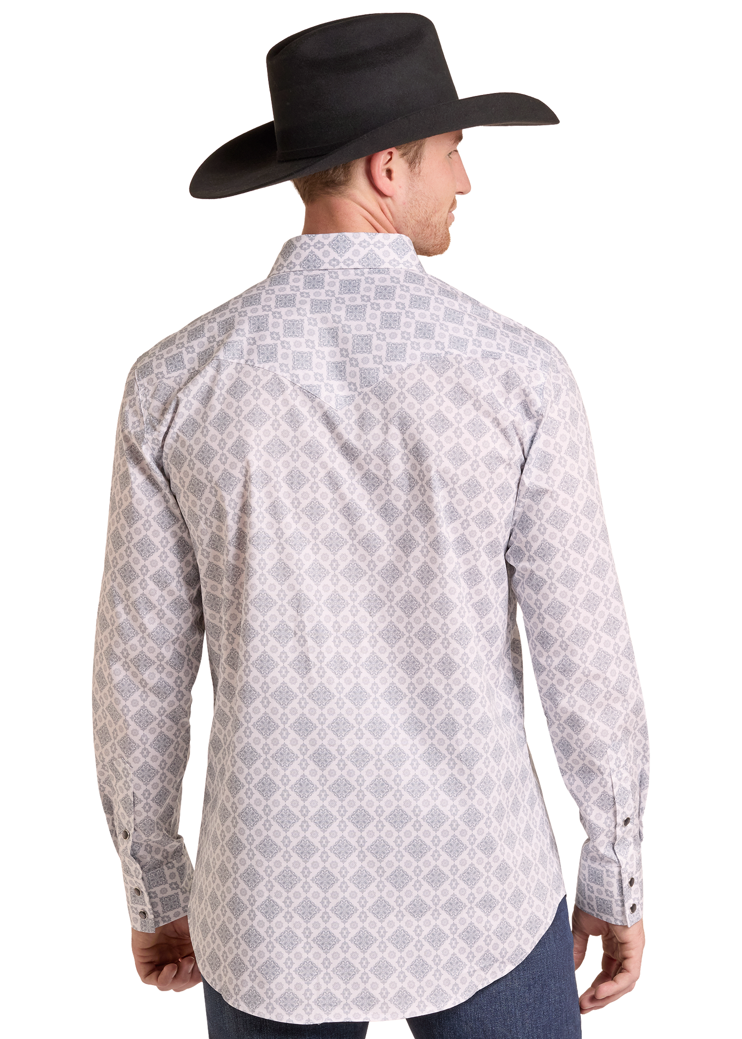 A man wearing a light gray and white geometric patterned western shirt, shown from the back. He is also wearing a black cowboy hat and blue jeans, photographed against a solid white background.