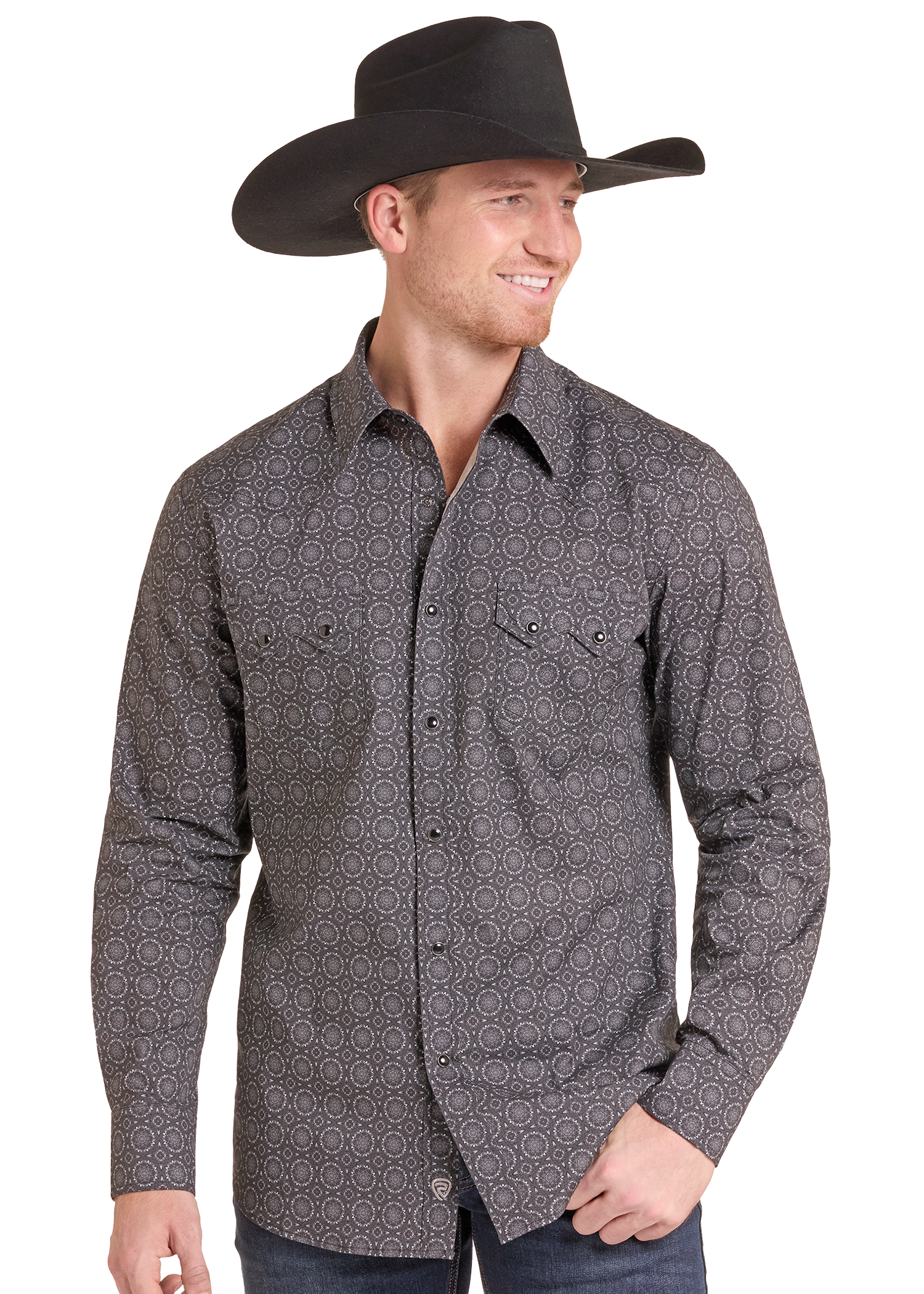 A man wearing a dark gray long-sleeve western button-down shirt with a subtle geometric pattern, paired with a black cowboy hat and blue jeans, shown against a plain white background.