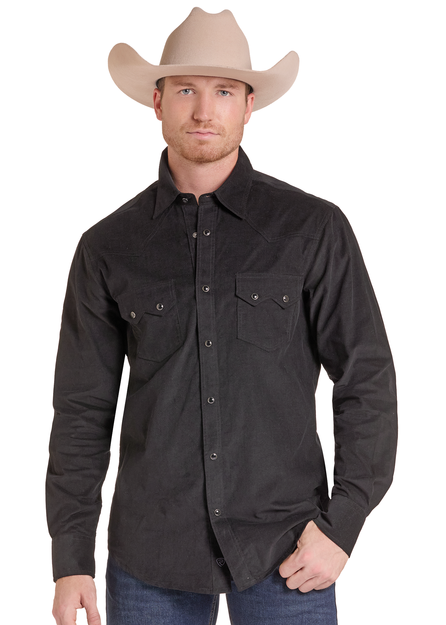 A man wearing a black western-style long-sleeve button-up shirt with two chest pockets and a beige cowboy hat, photographed against a plain white background.