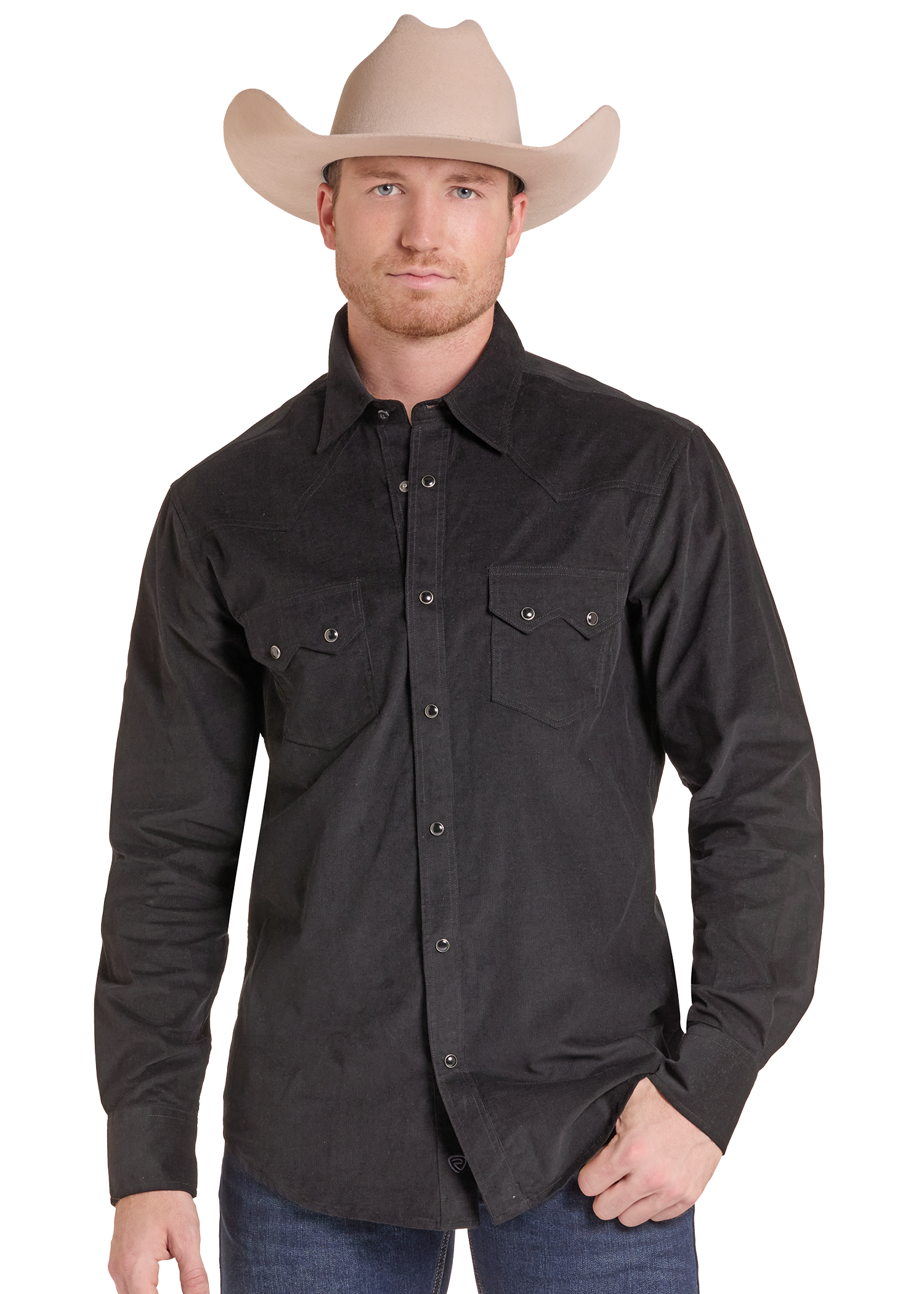 A man wearing a black western-style long-sleeve button-up shirt with two chest pockets and a beige cowboy hat, photographed against a plain white background.