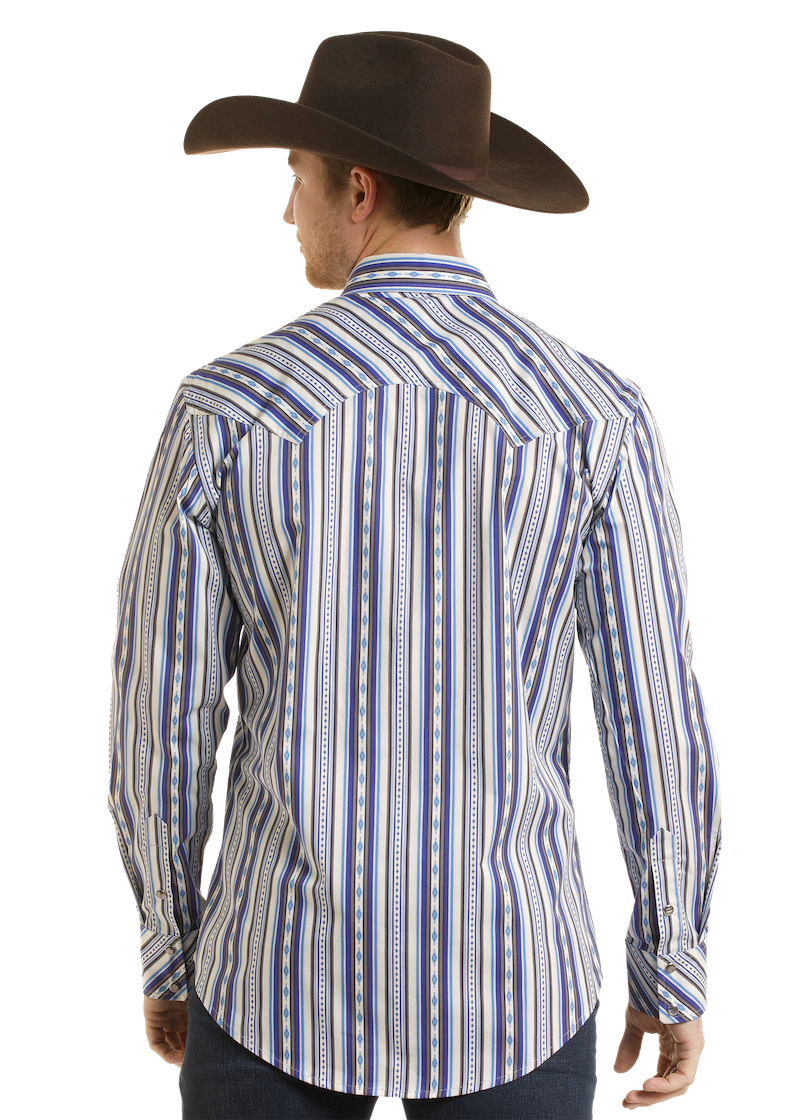 A man viewed from the back wearing a brown cowboy hat and a long-sleeve western shirt with vertical blue, white, and tan stripes, paired with dark jeans against a white studio background.