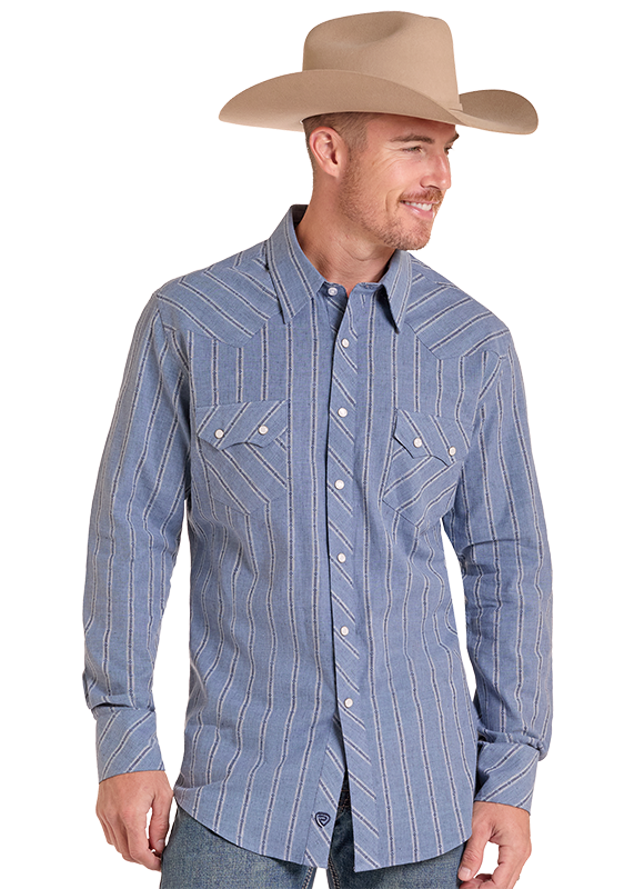 A man wearing a tan cowboy hat and a blue pinstriped western shirt, shown from the waist up against a plain white background.