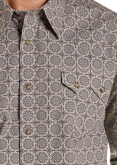 Close up of a medallion pearl snap shirt. 