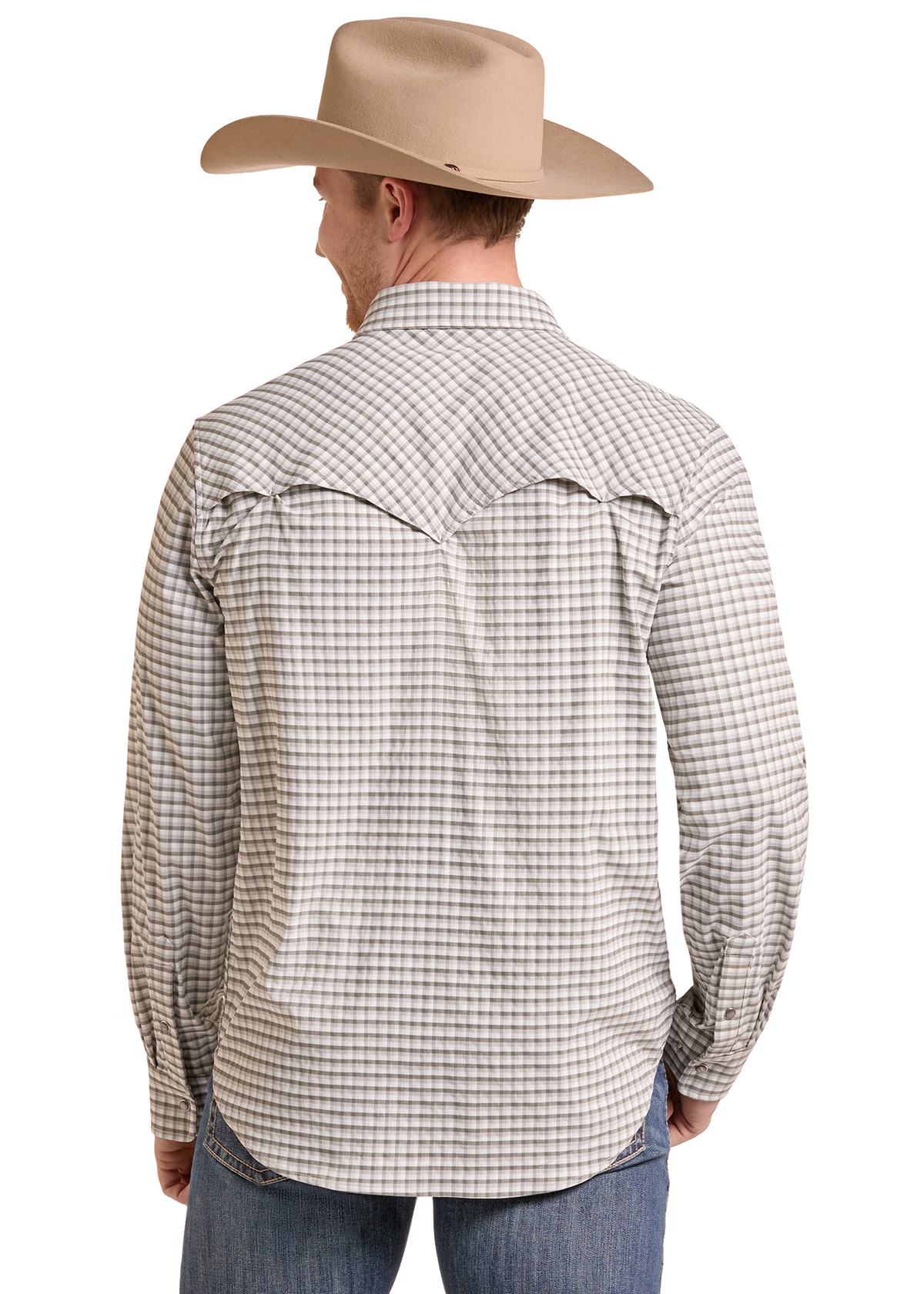 A man viewed from the back wearing a tan cowboy hat, a beige and gray checkered western long-sleeve shirt, and blue jeans against a plain white background.