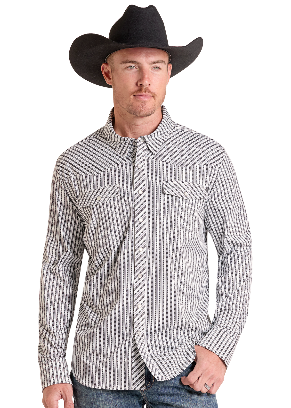 A man wearing a black cowboy hat and a black-and-white vertically striped western long-sleeve button-up shirt, paired with blue jeans, photographed against a plain white background.