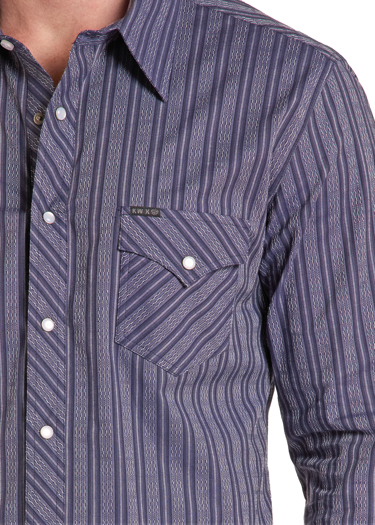 Close-up of a men's button-down shirt with vertical blue and white striped patterns, featuring a chest pocket with a visible 'KENZO' label.