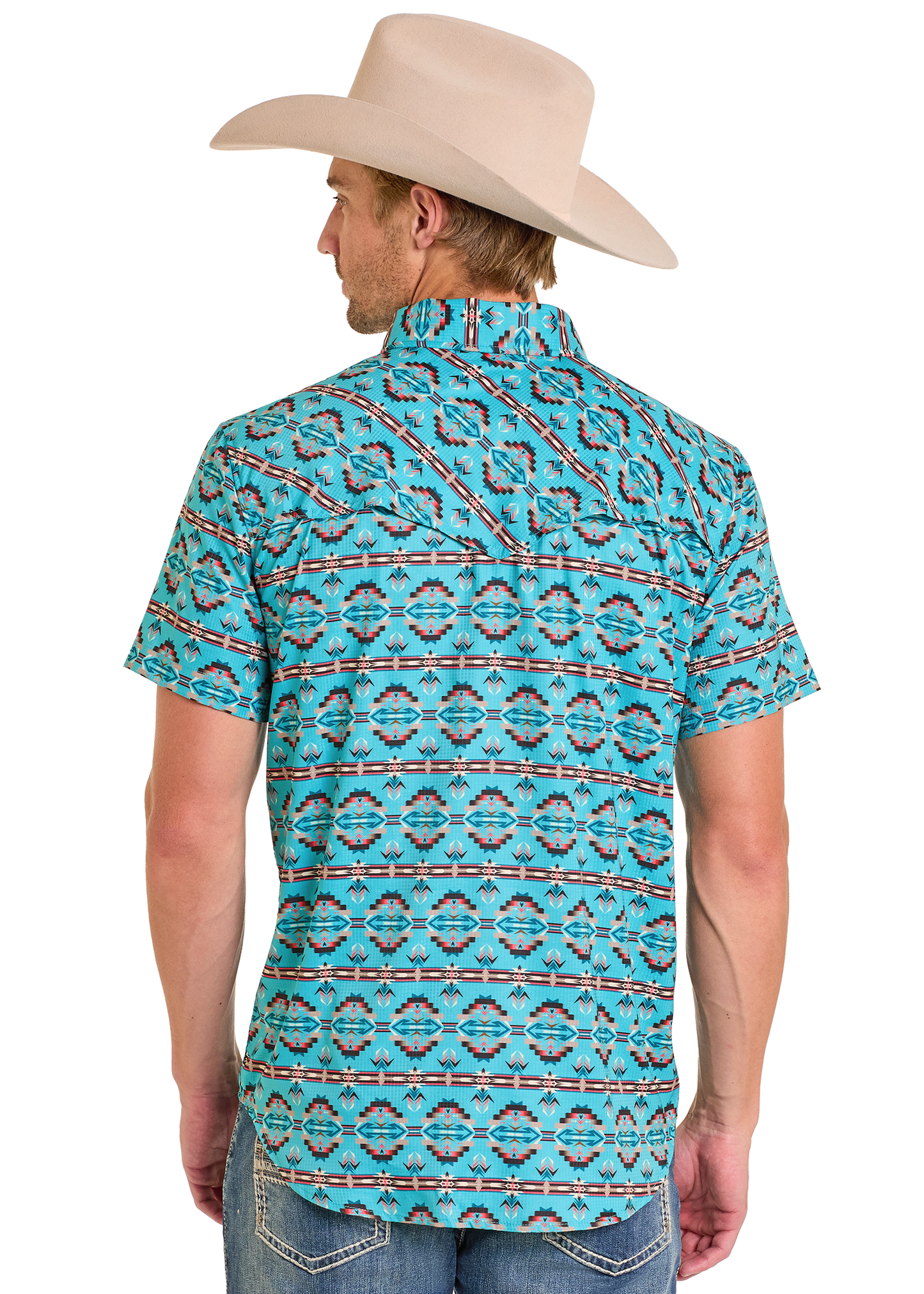 Man wearing a turquoise patterned shirt and beige cowboy hat on a white background