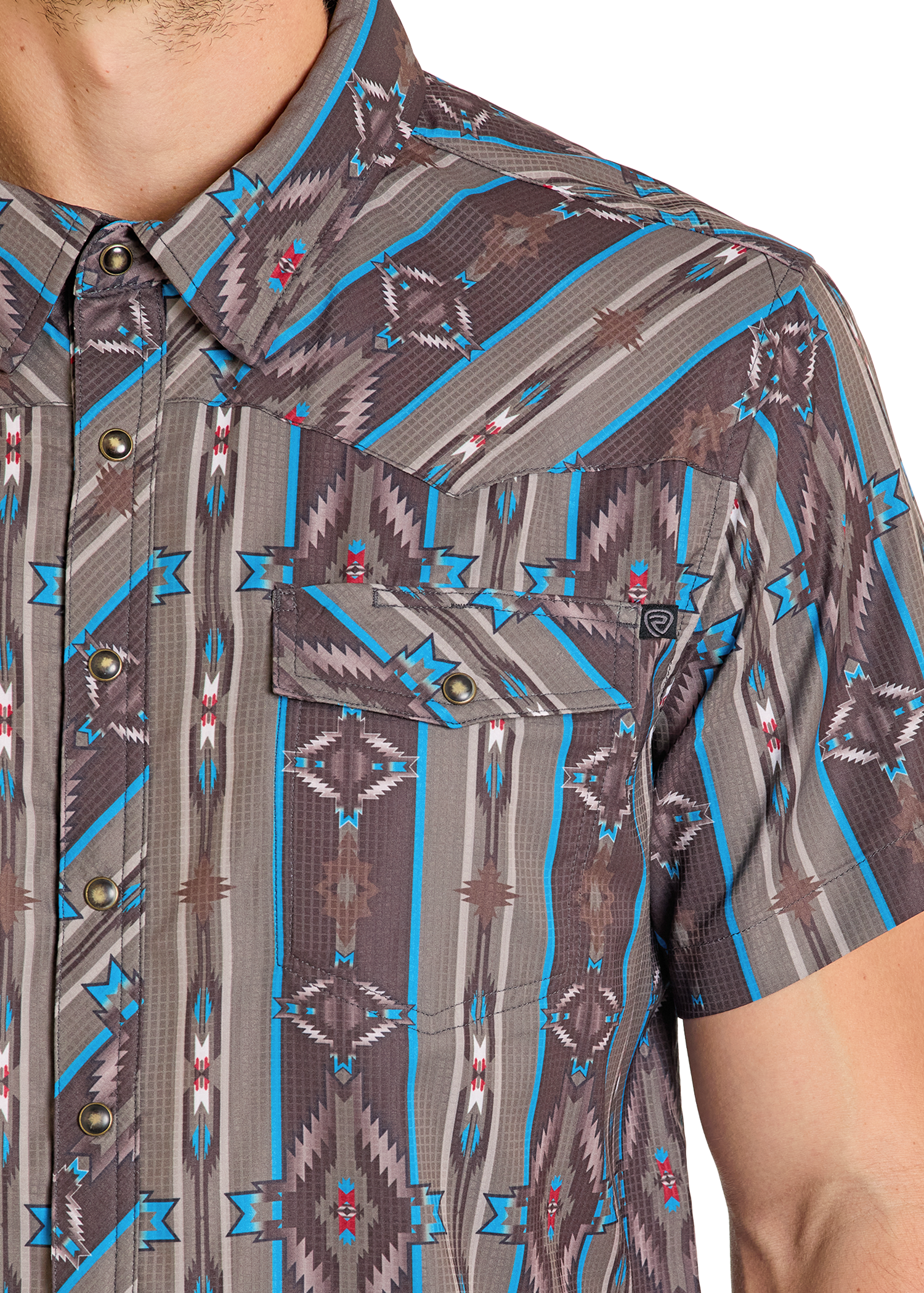Close-up of a patterned shirt with geometric design