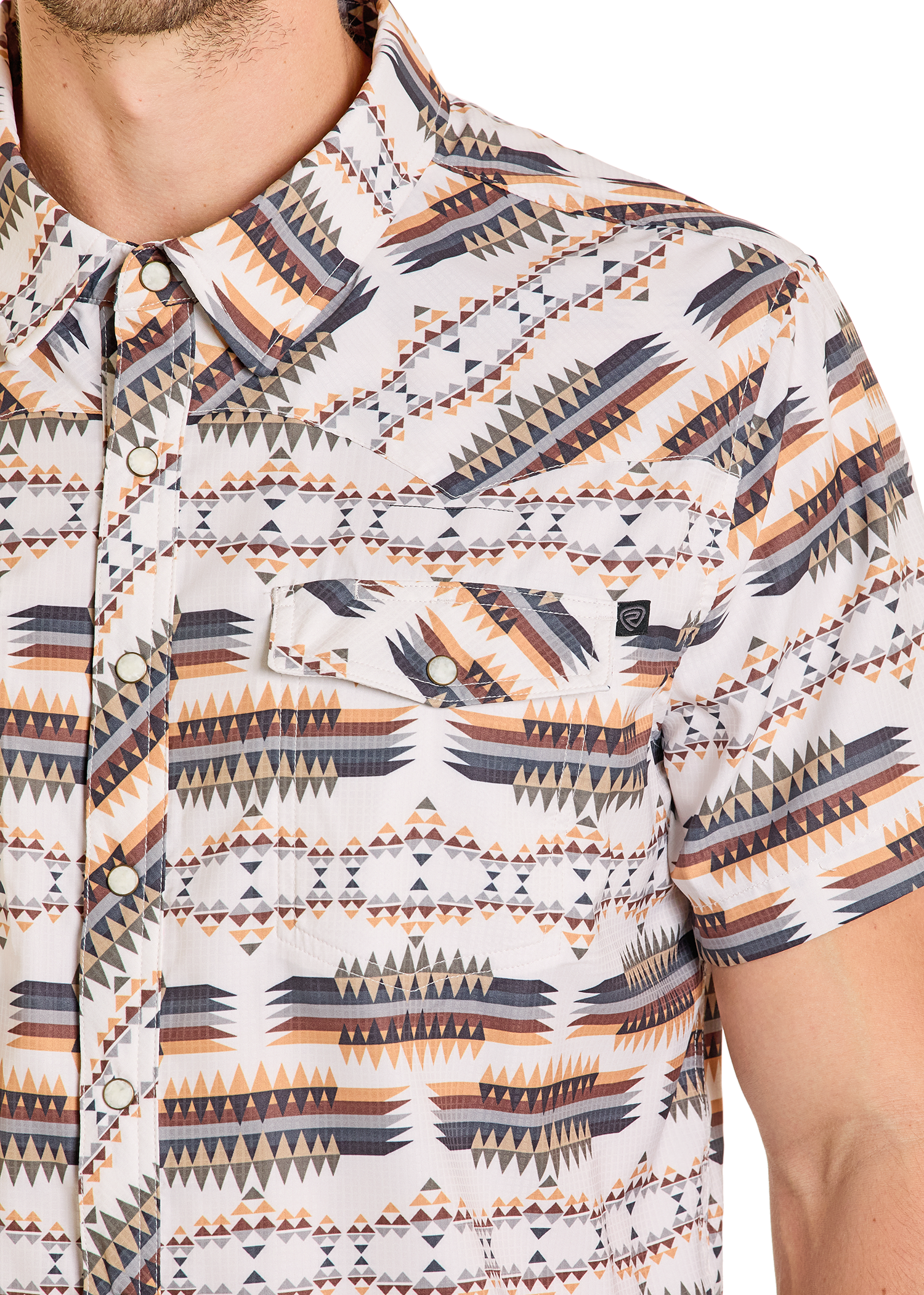 Close-up of a patterned shirt with geometric design on a white background