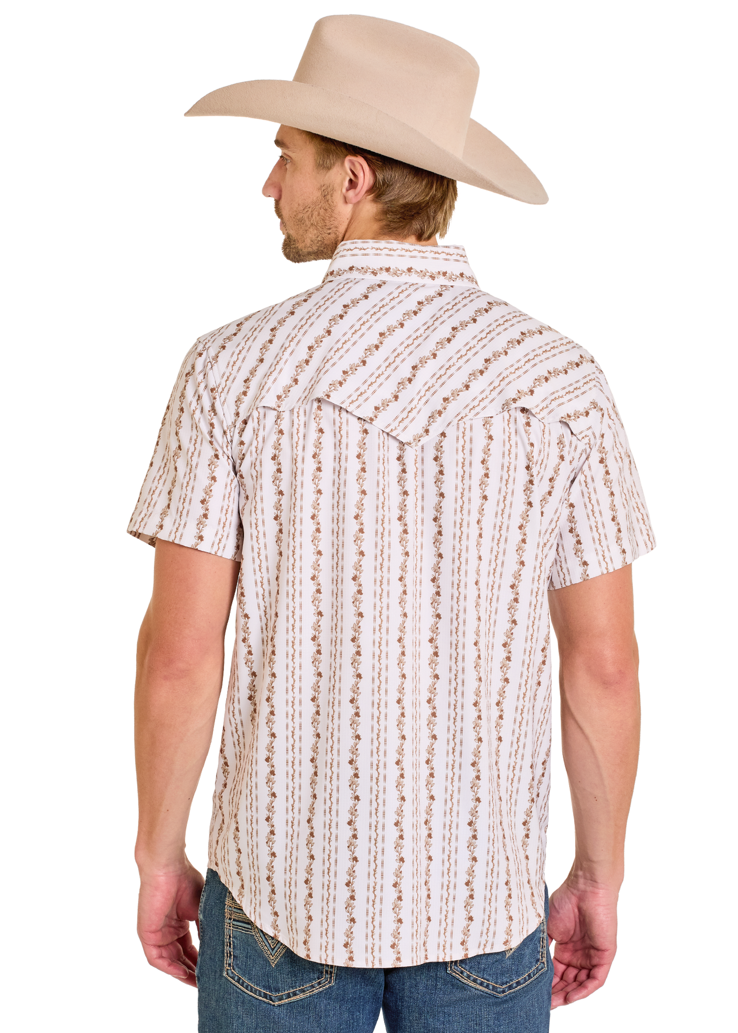 Man wearing a patterned short-sleeve shirt and beige cowboy hat on a white background