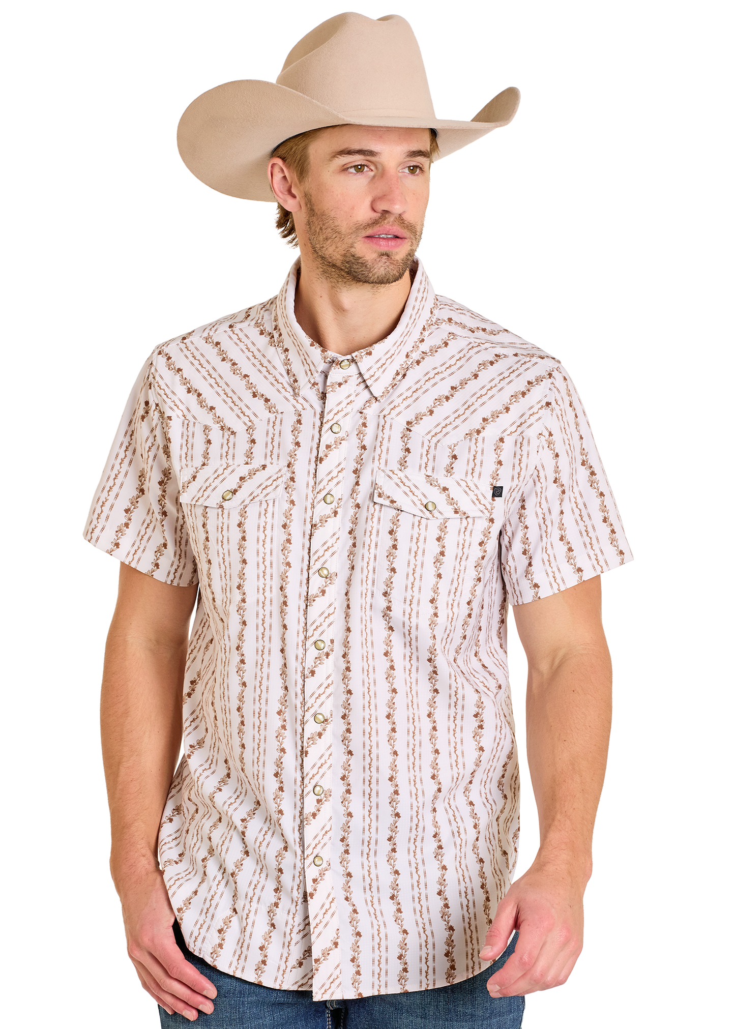 Man wearing a patterned short-sleeve shirt and beige cowboy hat on a white background