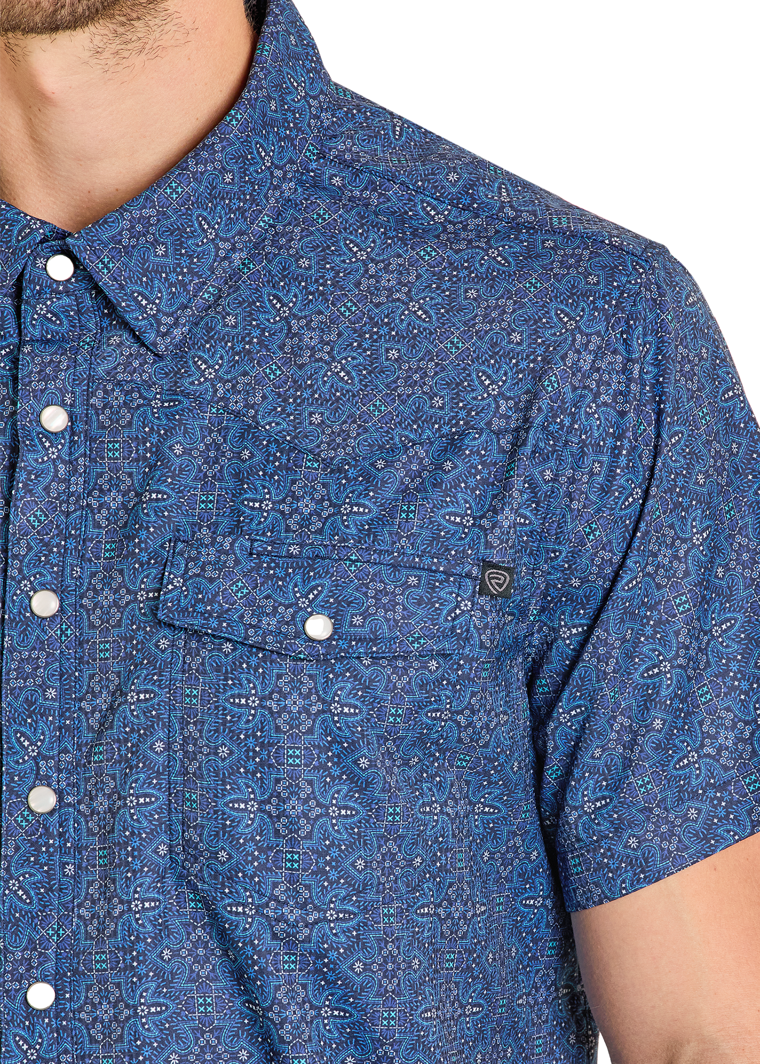 Blue patterned shirt worn by a person