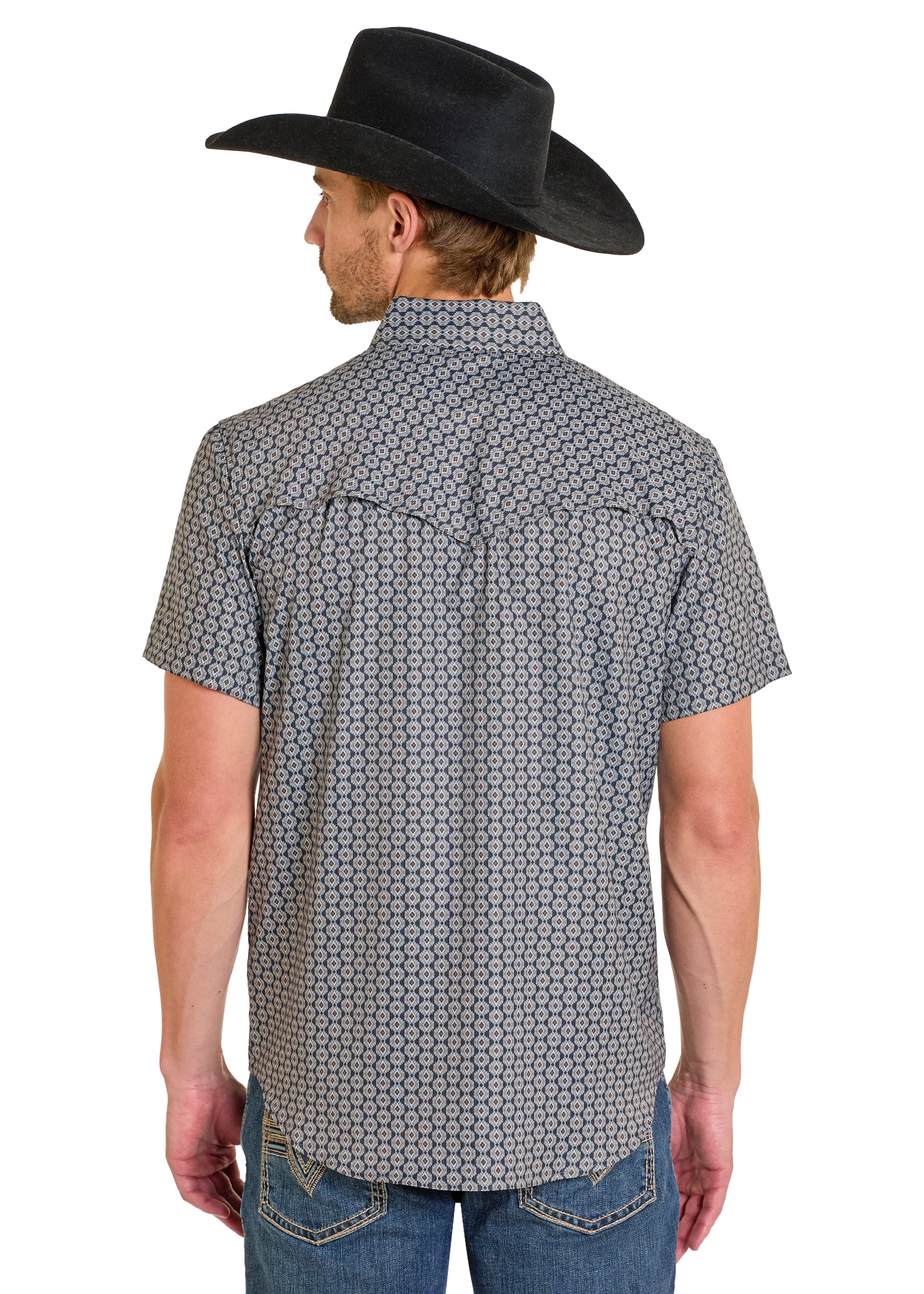 Man wearing a patterned short-sleeve shirt and black cowboy hat on a white background