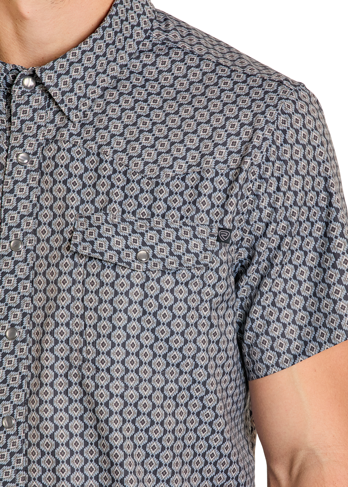 Close-up of a patterned shirt with geometric design