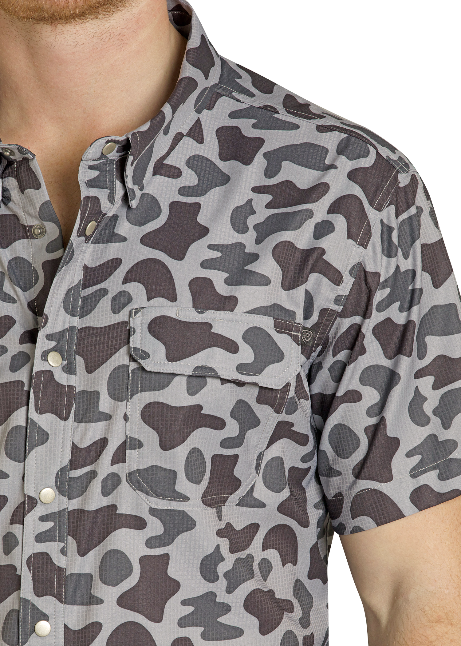 Close-up of a person wearing a camouflage-patterned shirt.