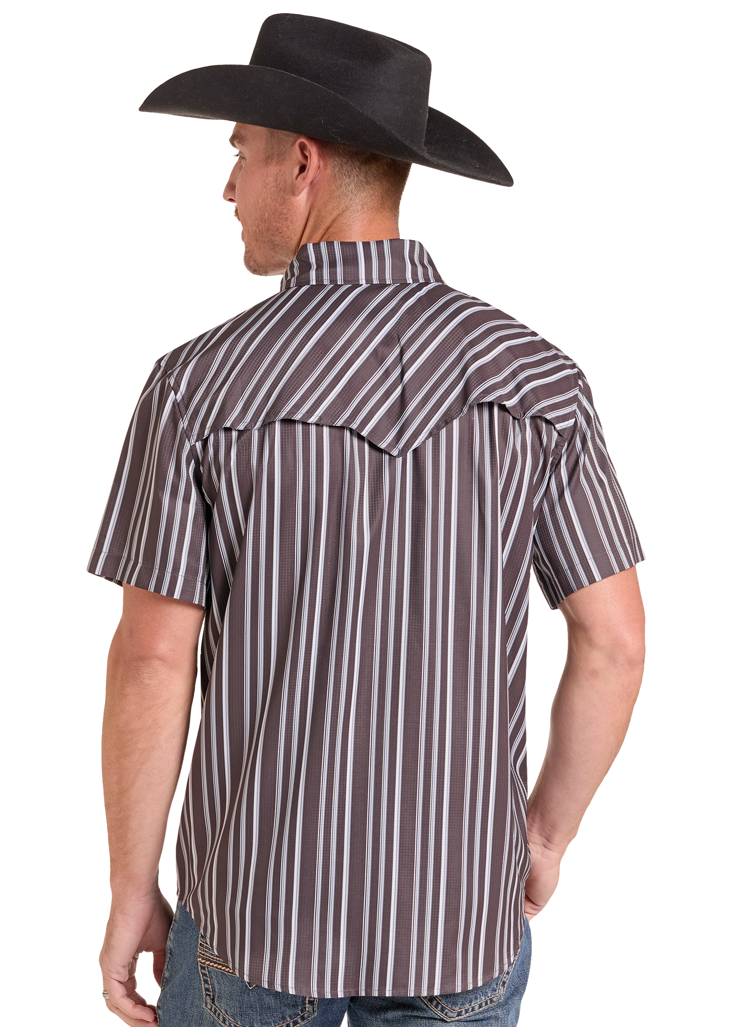 A man wearing a brown and white vertically striped short-sleeve western shirt, viewed from the back, paired with a black cowboy hat and blue jeans against a white background.