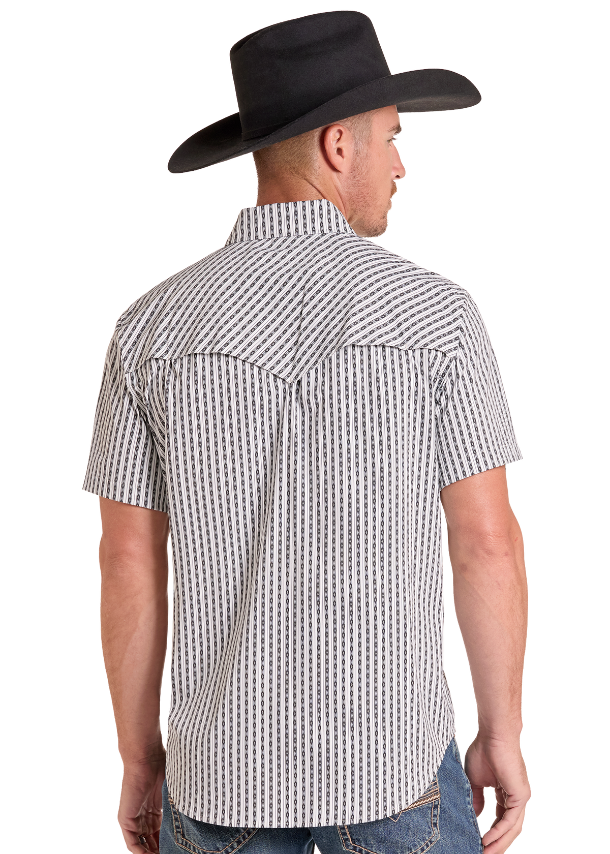 A man shown from the back wearing a black cowboy hat and a short-sleeve button-up shirt with a black and white micro-pattern, paired with blue jeans against a white background.