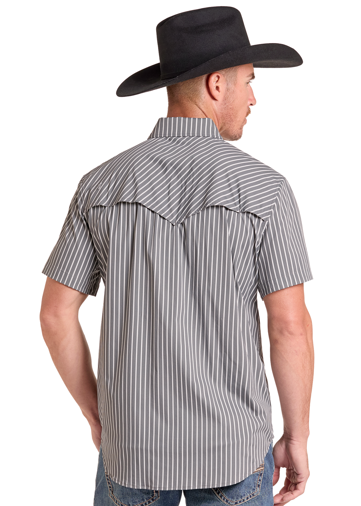 A man wearing a gray and white vertically striped short-sleeve western shirt, viewed from the back. He is also wearing a black cowboy hat and blue jeans, set against a plain white background.
