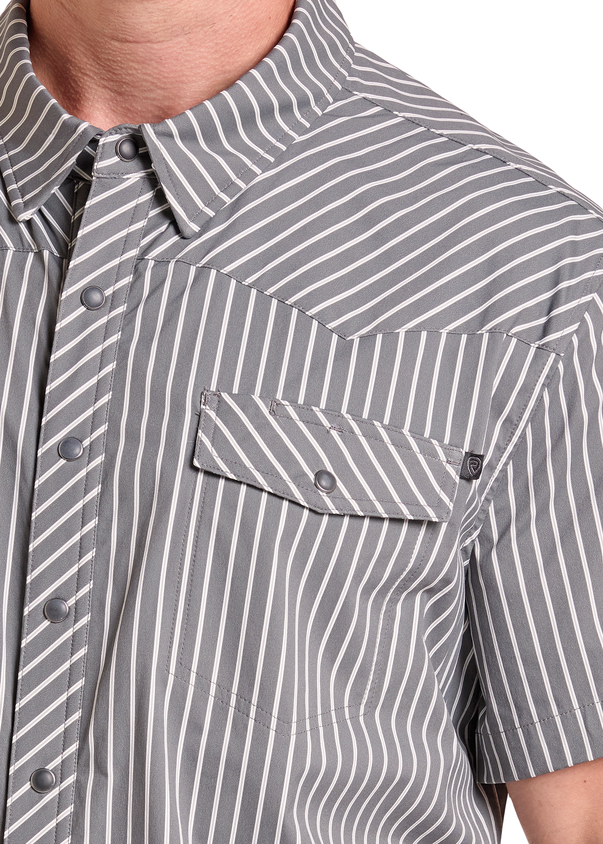 Close-up of a gray short-sleeve button-up shirt with white vertical pinstripes, featuring a chest pocket and snap buttons.