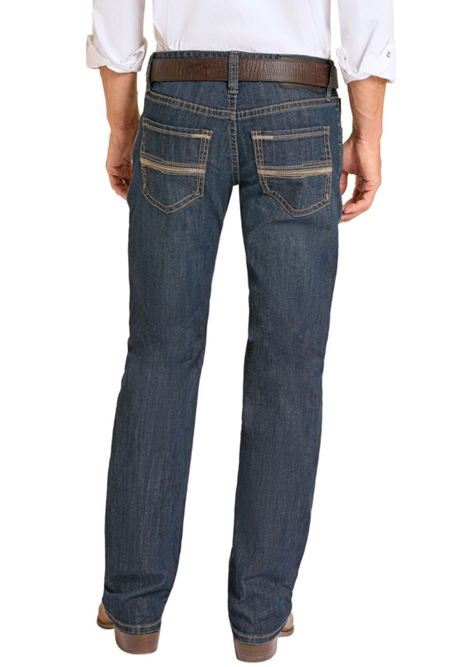 Man wearing a white shirt, blue jeans, and cowboy boots on a white background