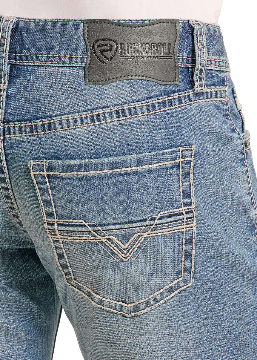 Detail image of an embroidered denim pocket.