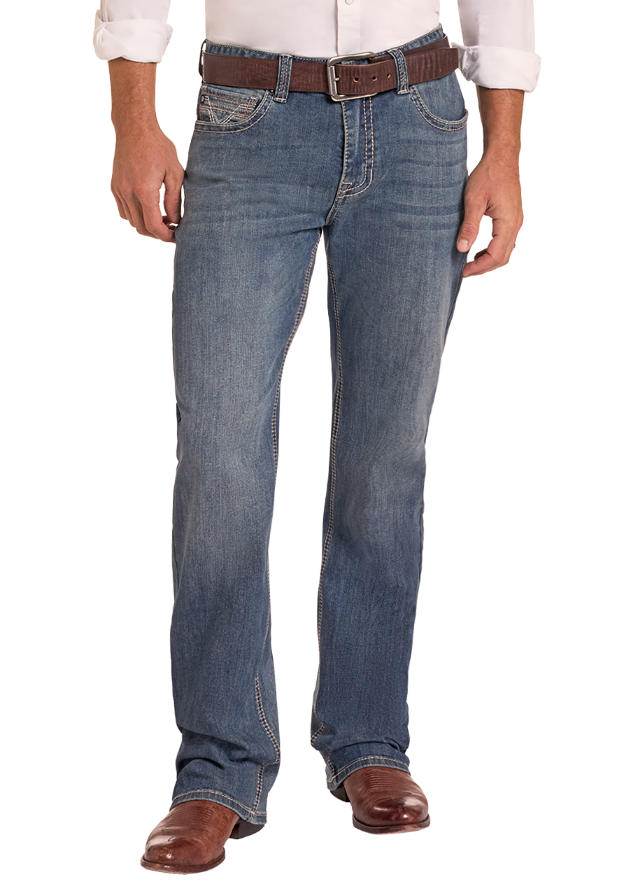A man wearing a light pink western long-sleeve button-down shirt, blue jeans, a brown belt, brown boots, and a tan cowboy hat, standing against a plain white background.